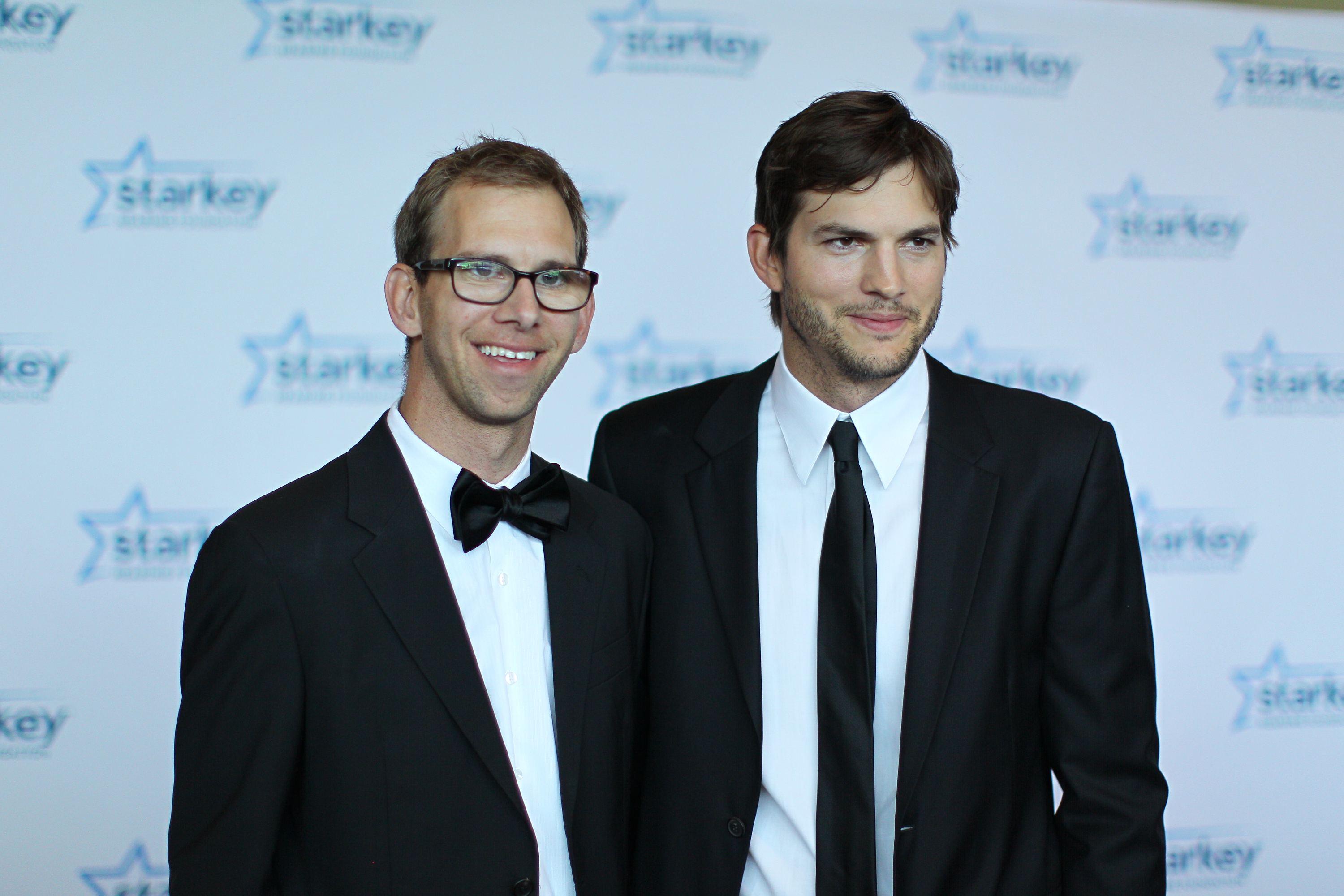 Michael Kutcher and Ashton Kutcher on July 28, 2013, in St. Paul, Minnesota | Source: Getty Images