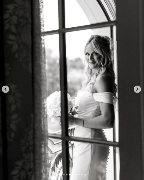 Victoria Schultz posing for a picture in her wedding gown, posted on July 26, 2024 | Source: Instagram/antpagephoto and alenkafilms