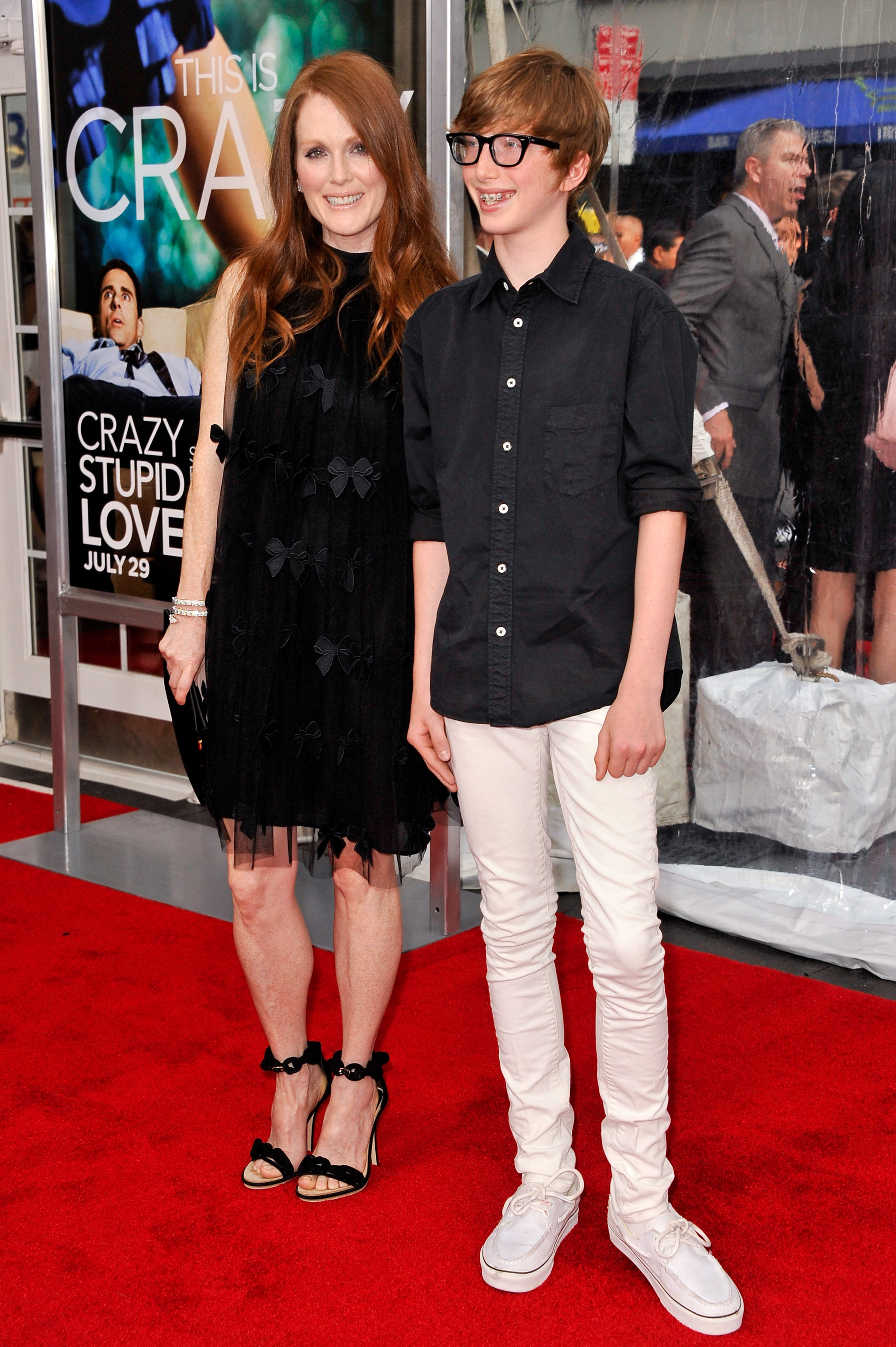 Julianne Moore and her son Caleb Freundlich on the red carpet at the "Crazy, Stupid, Love" world premiere on July 19, 2011, in New York City | Source: Getty Images