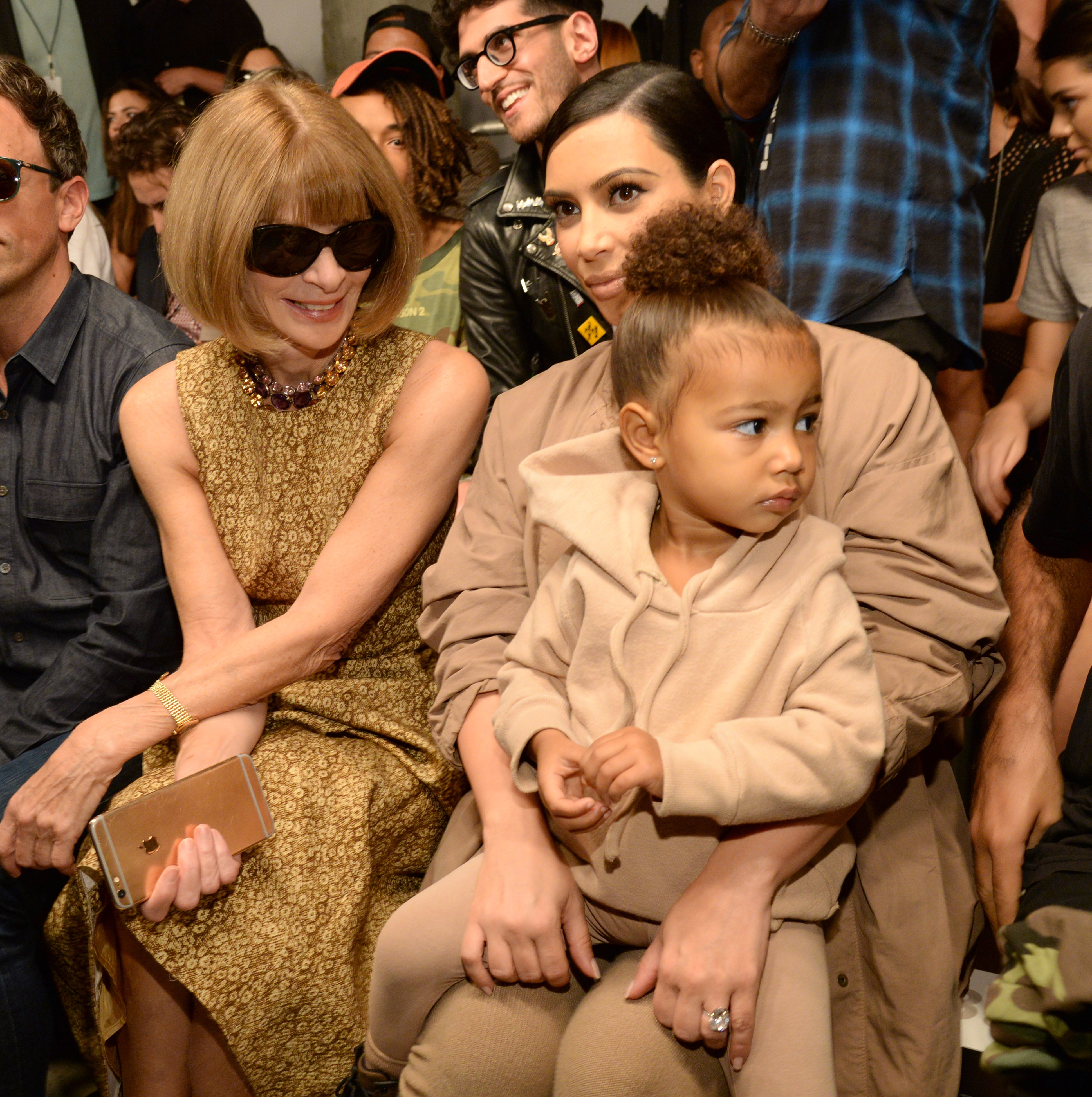 Anna Wintour, Kim Kardashian West, and North West attend Kanye West Yeezy Season 2 during New York Fashion Week in New York City, on September 16, 2015. | Source: Getty Images