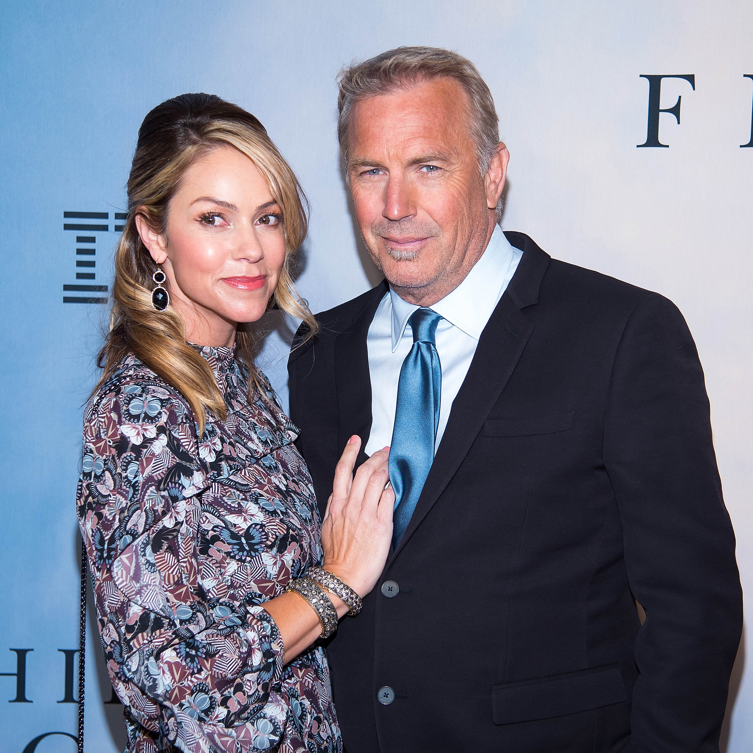 Christine Baumgartner and Kevin Costner at the "Hidden Figures" New York special screening on December 10, 2016 in New York City | Source: Getty Images