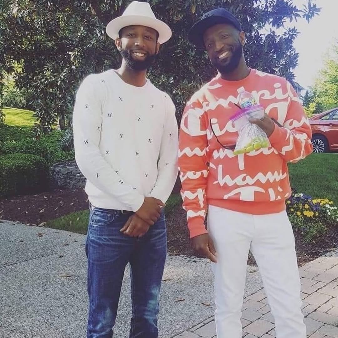 Rickey Smiley and his son Brandon, from a post dated January 30, 2023. | Source: Instagram/rocktholla