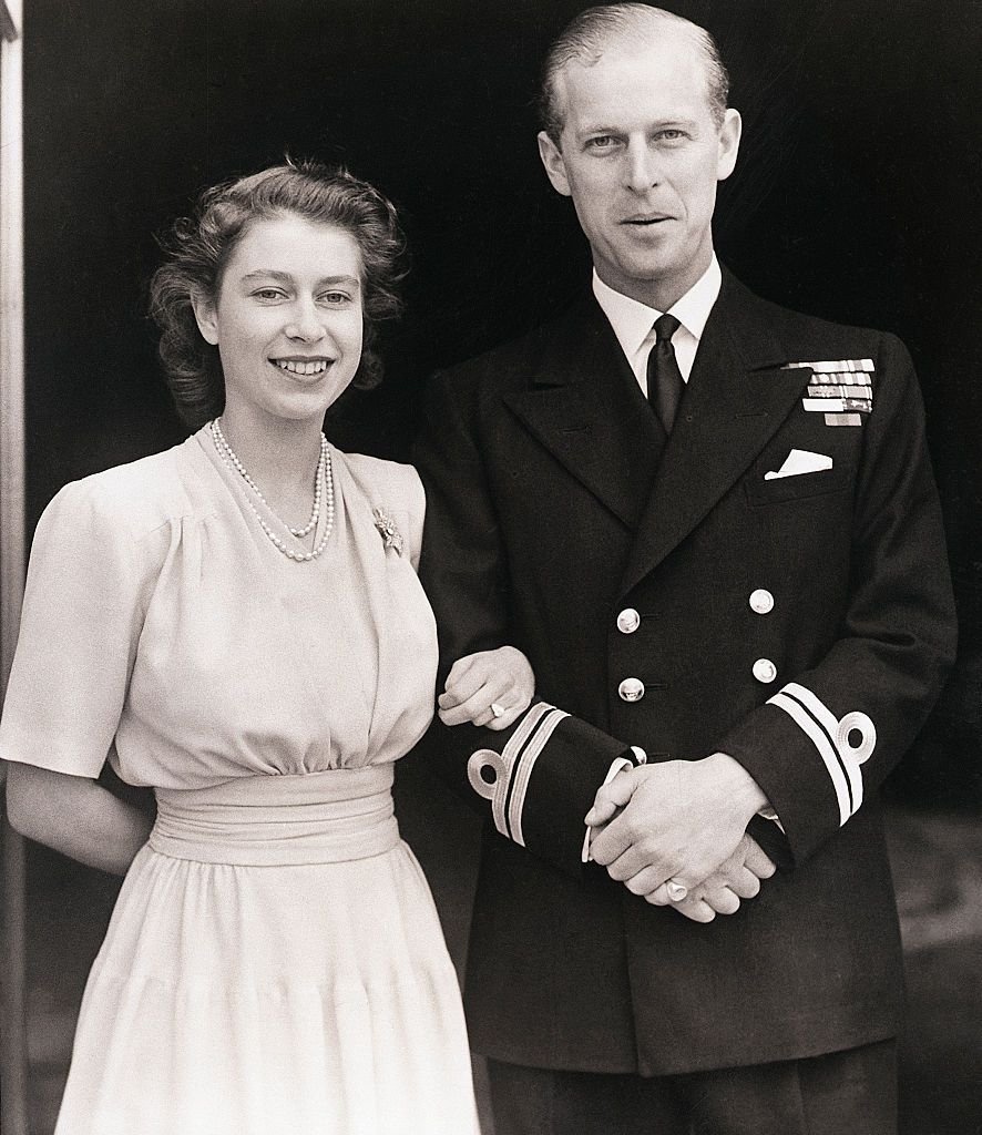 Princess Elizabeth and Lt. Philip Mountbatten at Buckingham Palace after the announcement of their betrothal in July 1947 | Source: Getty Images 