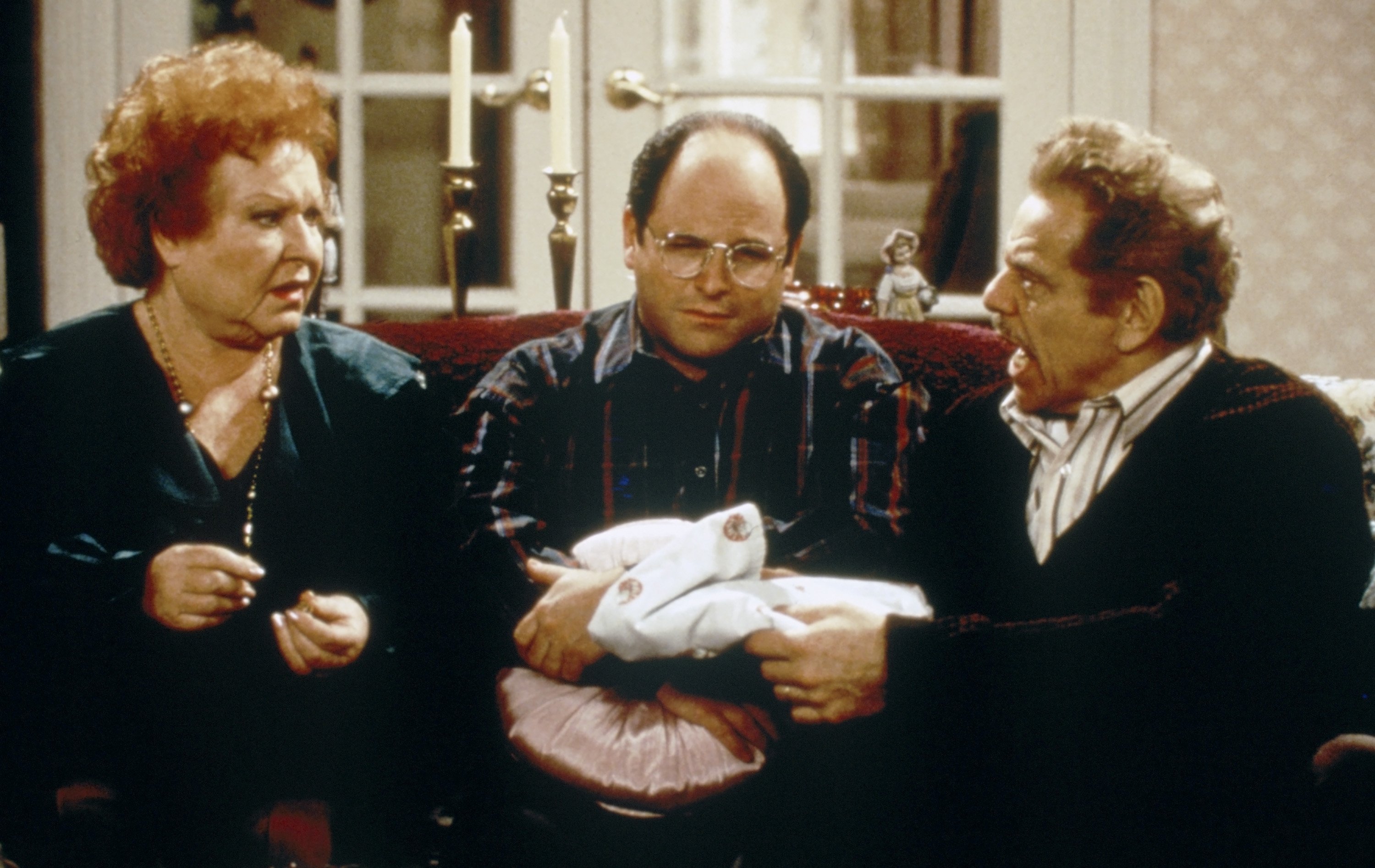 Estelle Harris as Estelle Costanza, Jason Alexander as George Costanza, Jerry Stiller as Frank Costanza on "The Showerhead" episode of "Seinfeld." | Source: Margaret Norton/Getty Images