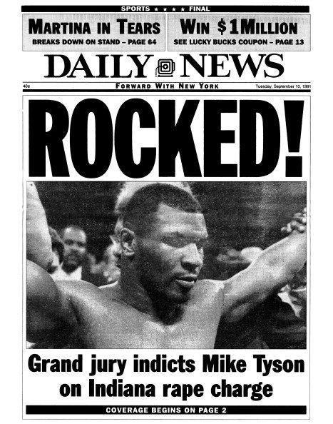 A daily news paper showing : ROCKED! Grand jury indicts Mike Tyson on Indiana rape charge.| Photo:Getty Images