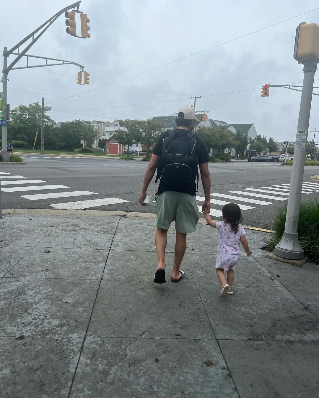 Johnny and Noa Gaudreau taking a walk, from an Instagram slideshow of pictures, dated September 1, 2024 | Source: Instagram/meredithgaudreau_