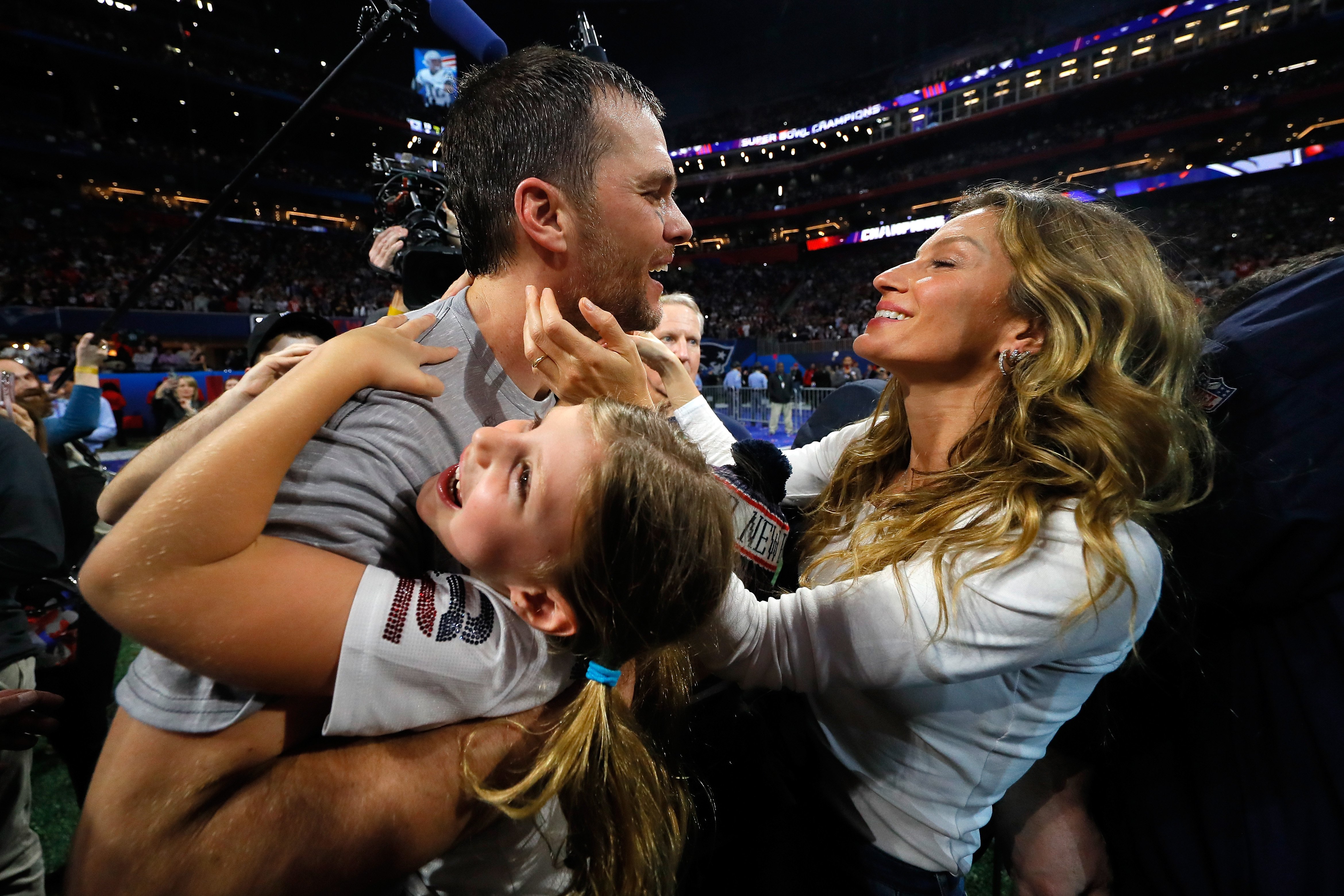 Tom Brady #12 of the New England Patriots celebrates with his wife Gisele Bündchen after the Super Bowl LIII against the Los Angeles Rams at Mercedes-Benz Stadium on February 3, 2019 in Atlanta, Georgia | Source: Getty Images 