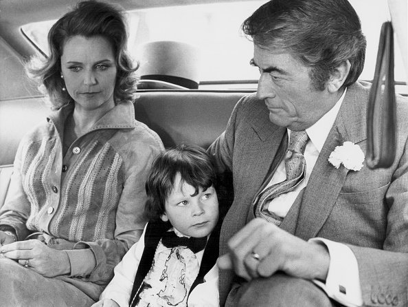 Lee Remick, Gregory Peck, and Harvey Stephens, in a scene from the 1976 movie "The Omen." | Photo: Getty Images