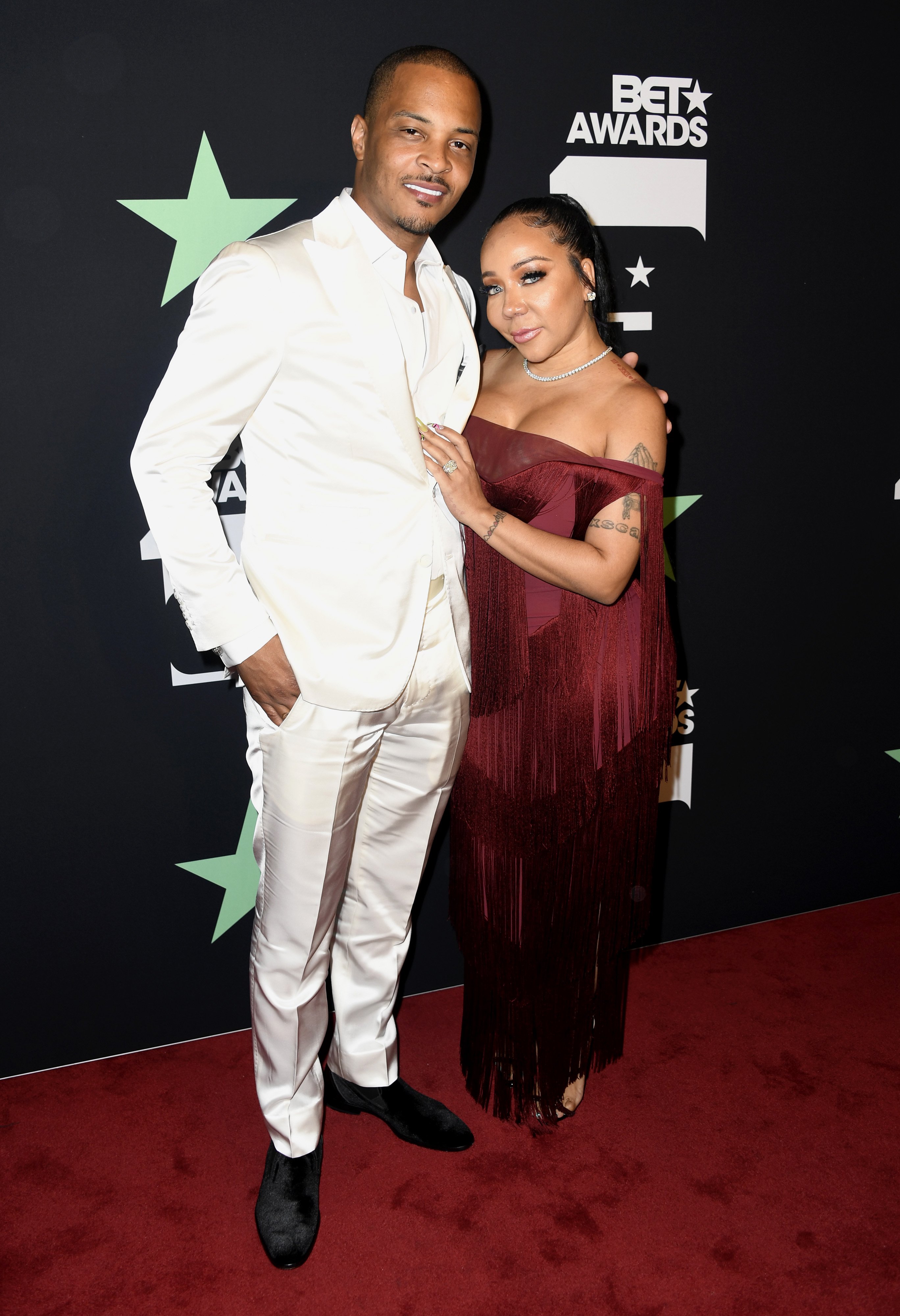  T.I. & Tameka "Tiny" Harris pose in the press room at the 2019 BET Awards on June 23, 2019.| Photo: GettyImages