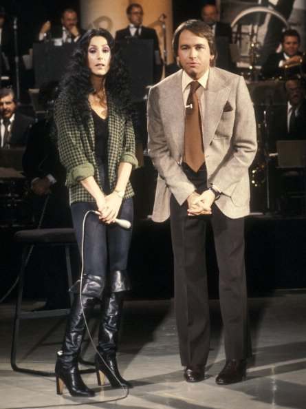 Singer Cher and actor John Ritter participate in the United Cerebral Palsy's "Weekend with the Stars" Telelthon on February 4, 1978 in Los Angeles, California. | Photo: Getty Images