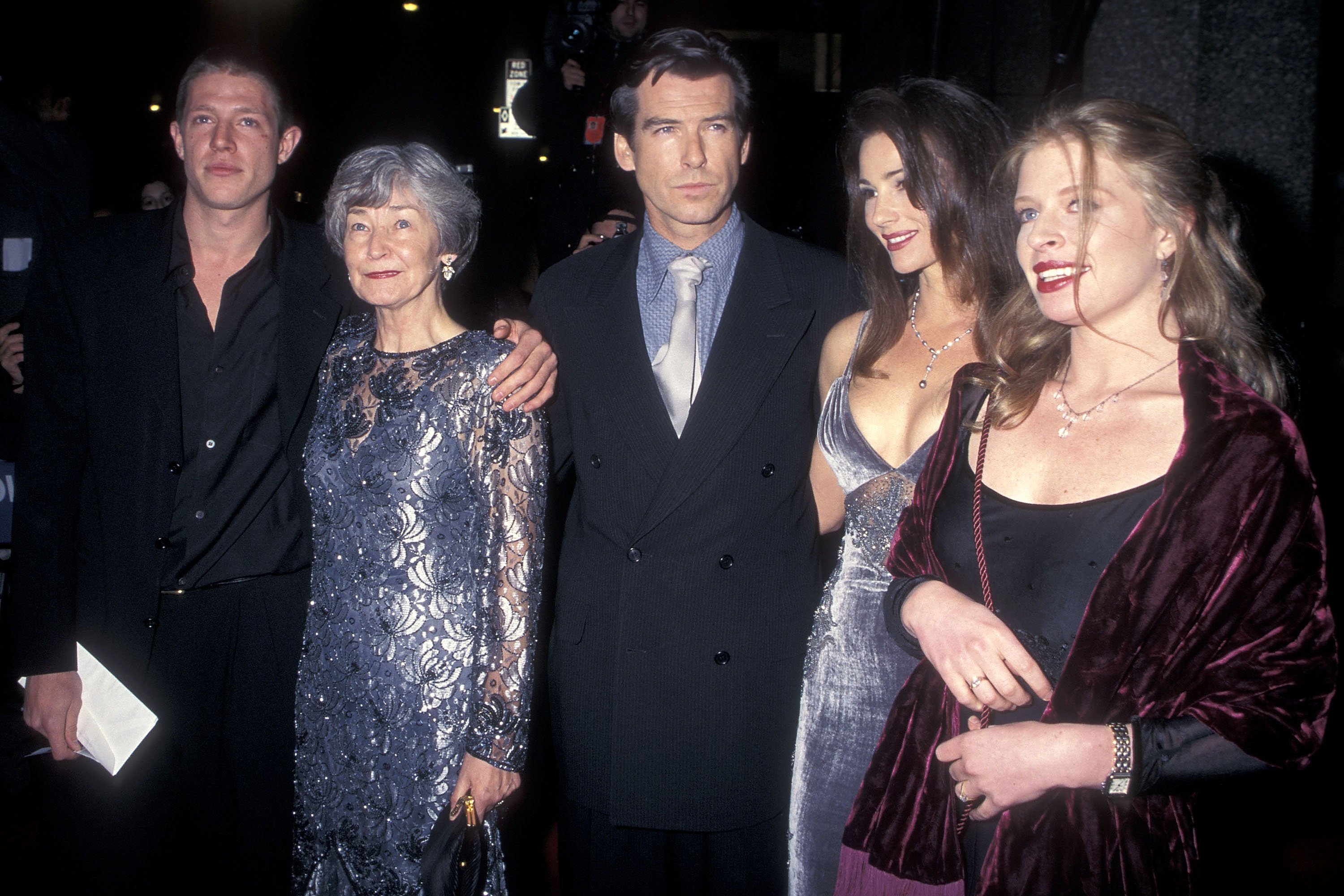 Actor Pierce Brosnan, girlfriend Keely Shaye Smith, his son Christopher Brosnan, his daughter Charlotte Brosnan and his mother May Smith attend the "Goldeneye" New York City Premiere Party on November 13, 1995 at Radio City Music Hall in New York City. | Source: Getty Images