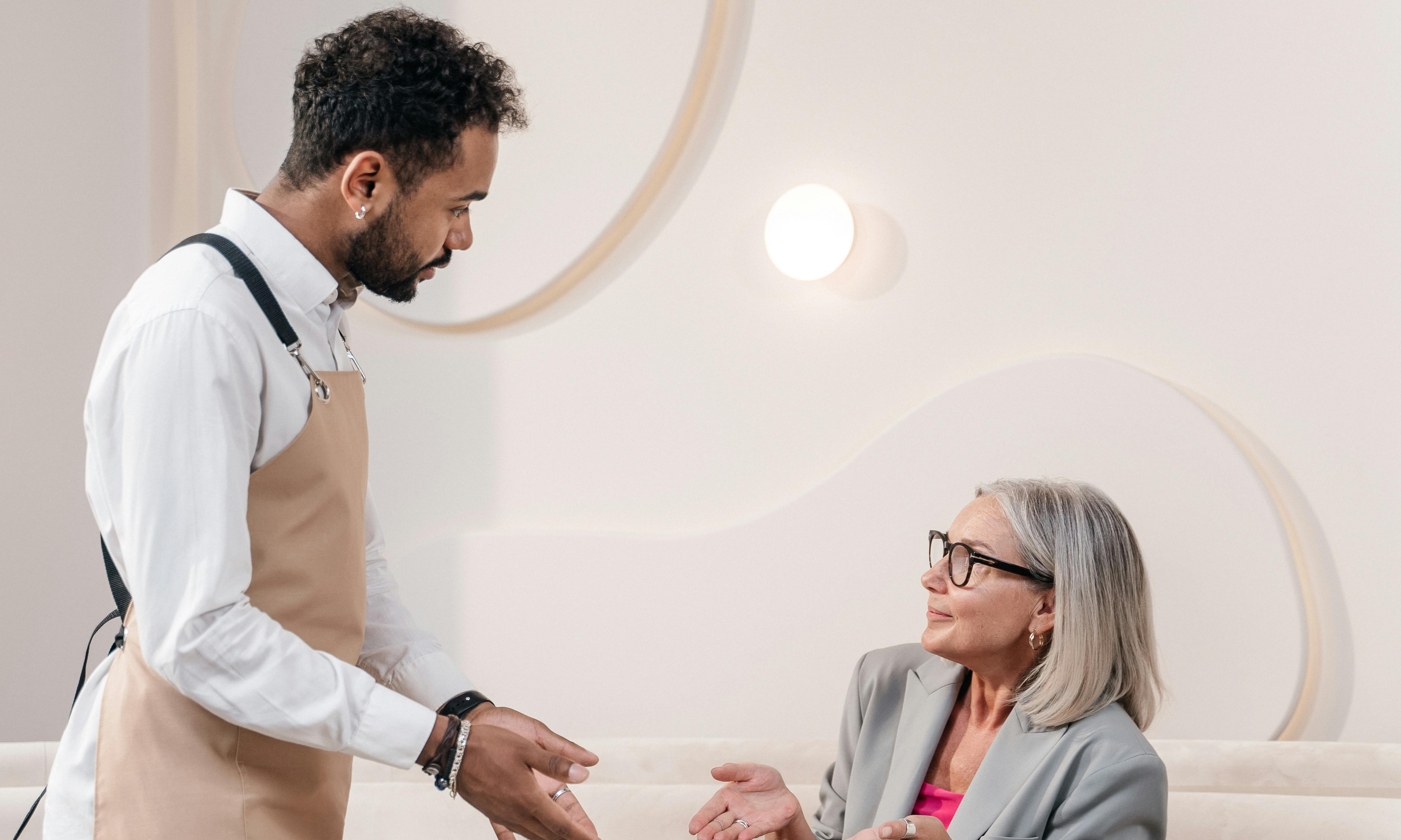 The waiter takes Ruth's hesitant order | Source: Pexels