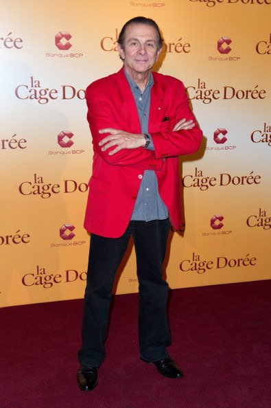 Roland Giraud assiste à la 'La Cage Doree' Paris Première au Cinéma Gaumont Marignan le 15 avril 2013 à Paris, France. | Photo : Getty Images