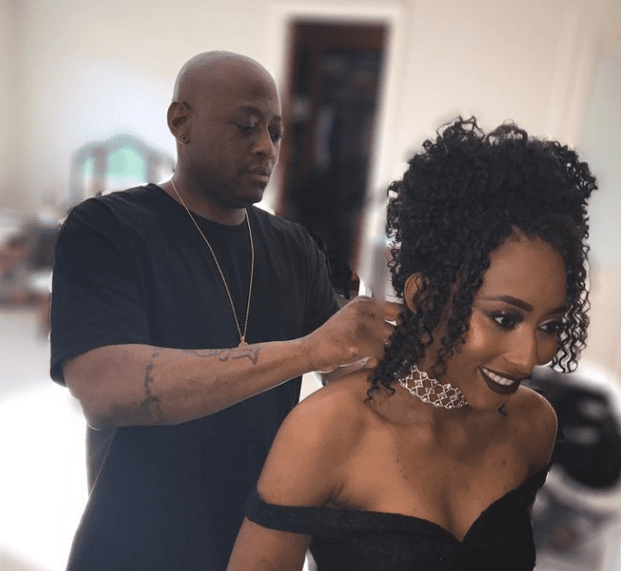 Photograph of Omar Epps helping his daughter Aiyanna Epps get ready for prom. | Source: Instagram/lovekeishaepps