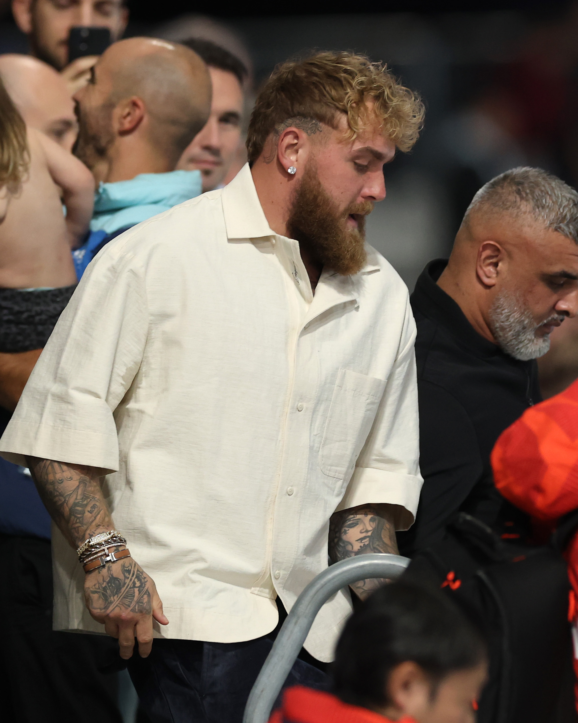 Jake Paul looks on during the Speed Skating Women's 500m at the Winter Olympic Games at Milano Speed Skating Stadium on February 15, 2026, in Milan, Italy | Source: Getty Images