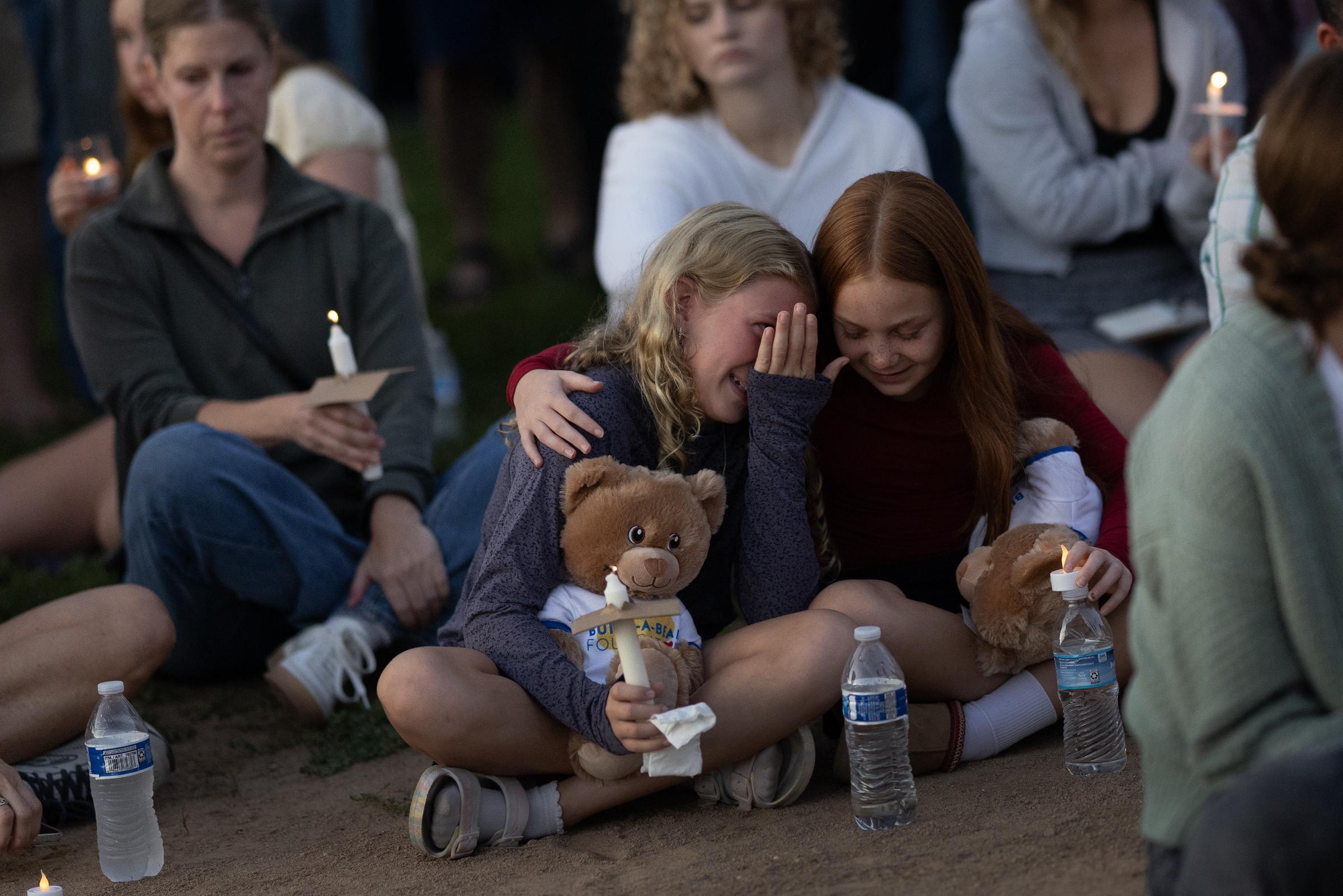 People at a vigil at Lynnhurst Park to mourn the dead and pray for the wounded after the gunman opened fire on students at Annunciation Catholic Church on August 27, 2025, in Minneapolis, Minnesota. | Source: Getty Images