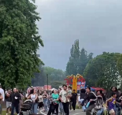 Another video shows crowds running through the festival grounds moments after shots rang out. Eyewitnesses later described hearing someone yell, "Shooting, shooting!" before fear spread through the crowd, sending attendees scrambling for cover and away from the danger. | Source: Instagram/leebotracks
