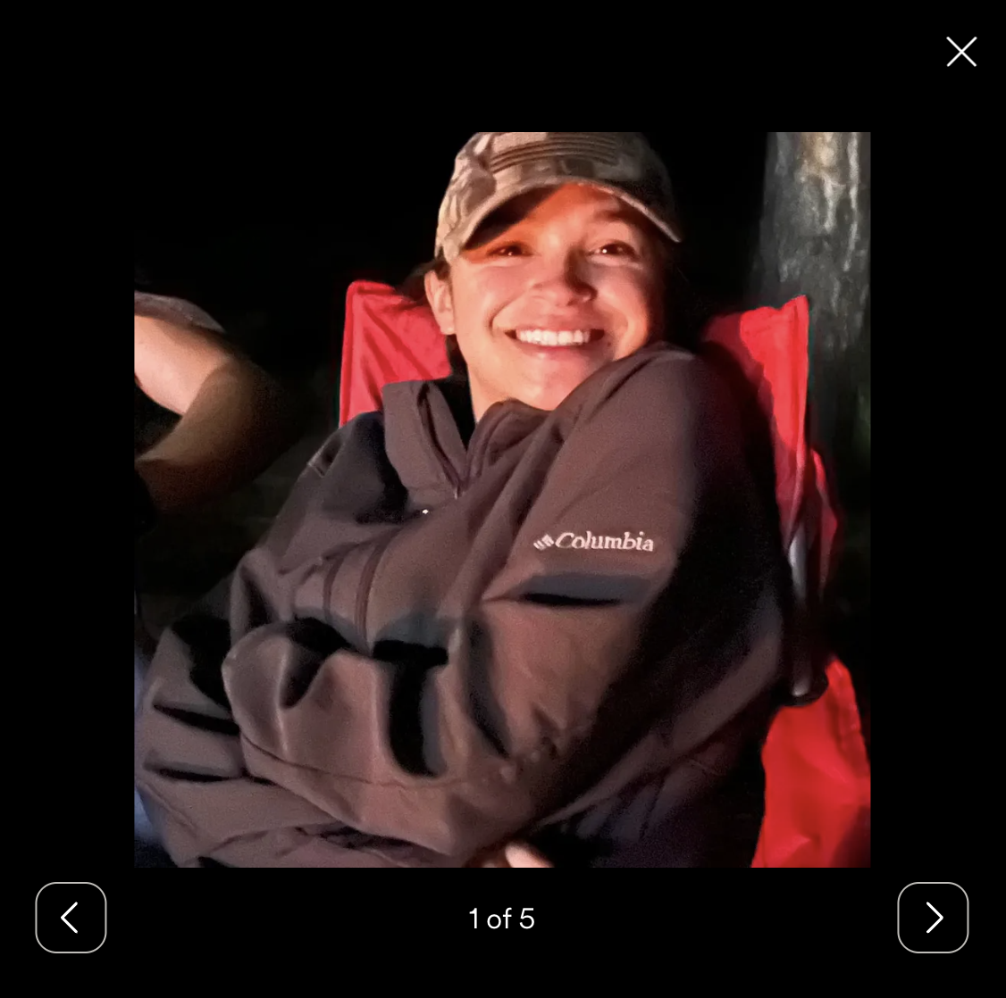Pandora is seen smiling at a campsite | Source: gofundme