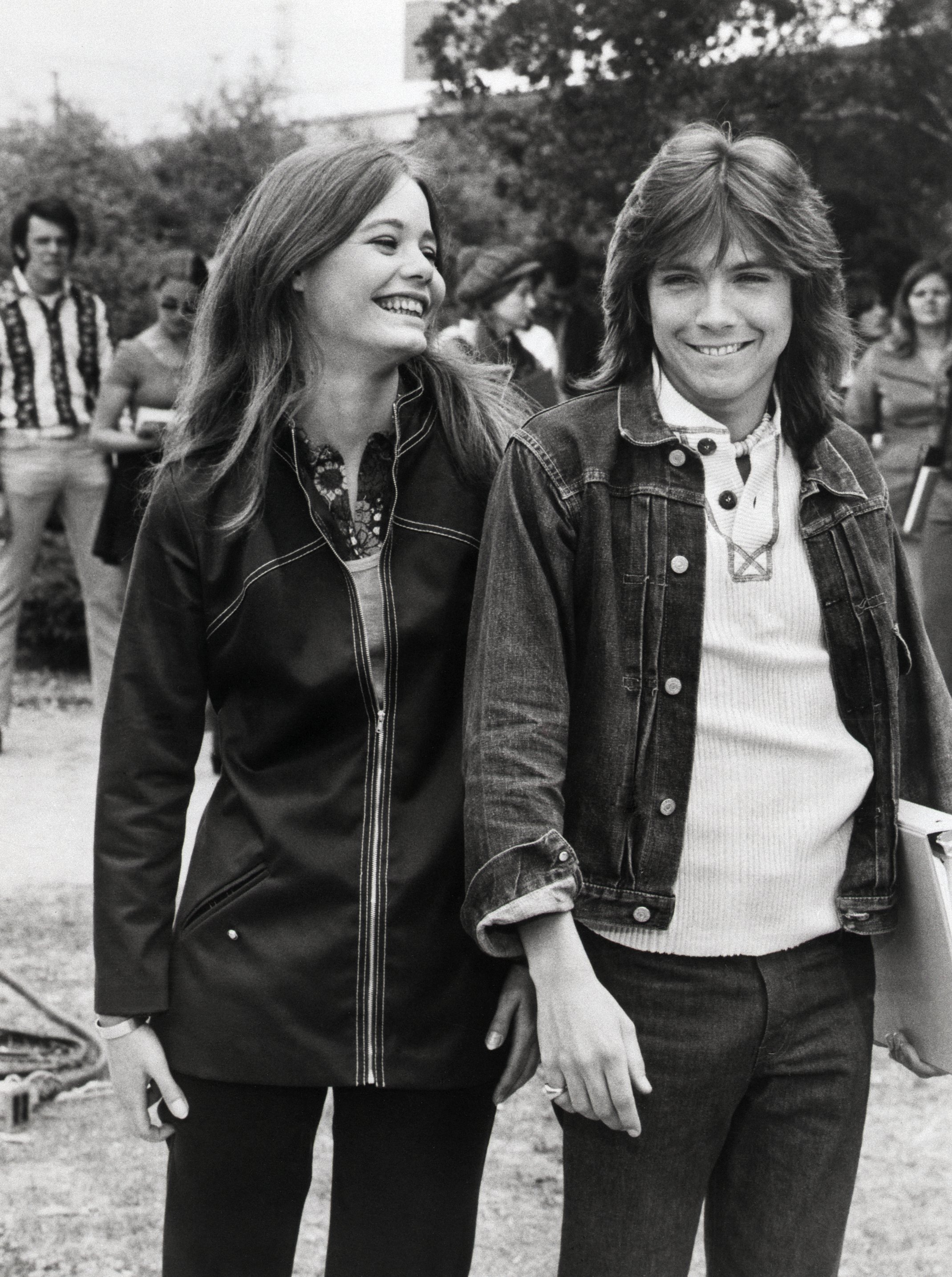 Susan Dey and David Cassidy, stars of "The Partridge Family", share a joke. | Source: Getty Images