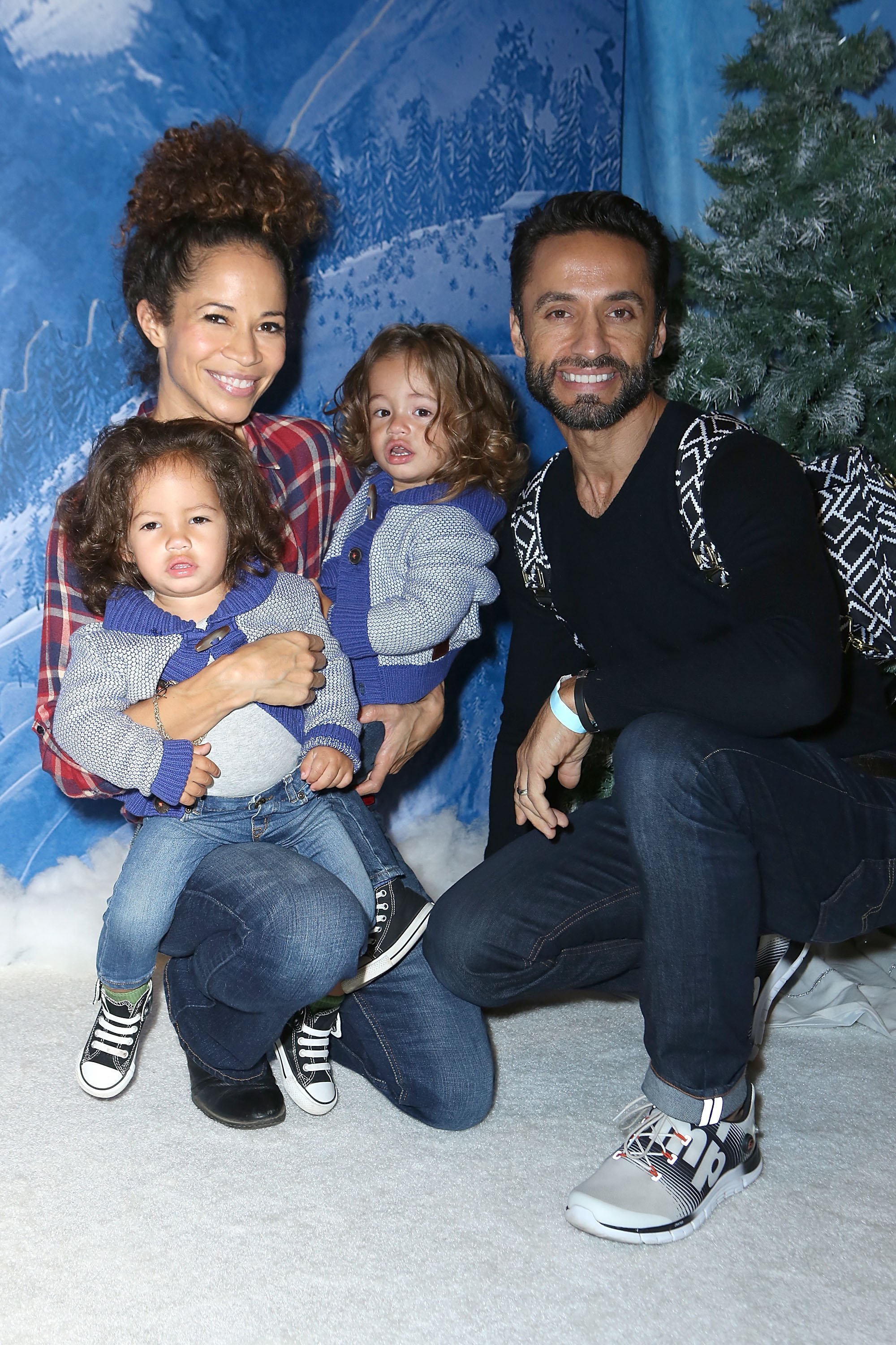 Sherri Saum, John, Michael, and Kamar De Los Reyes attend Disney On Ice Presents Frozen Los Angeles Premiere at Staples Center on December 10, 2015, in Los Angeles, California. | Source: Getty Images.