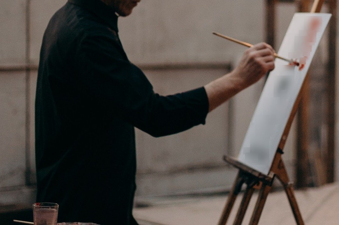 He finished the painting and revealed it when Cynthia came to visit. | Source: Pexels