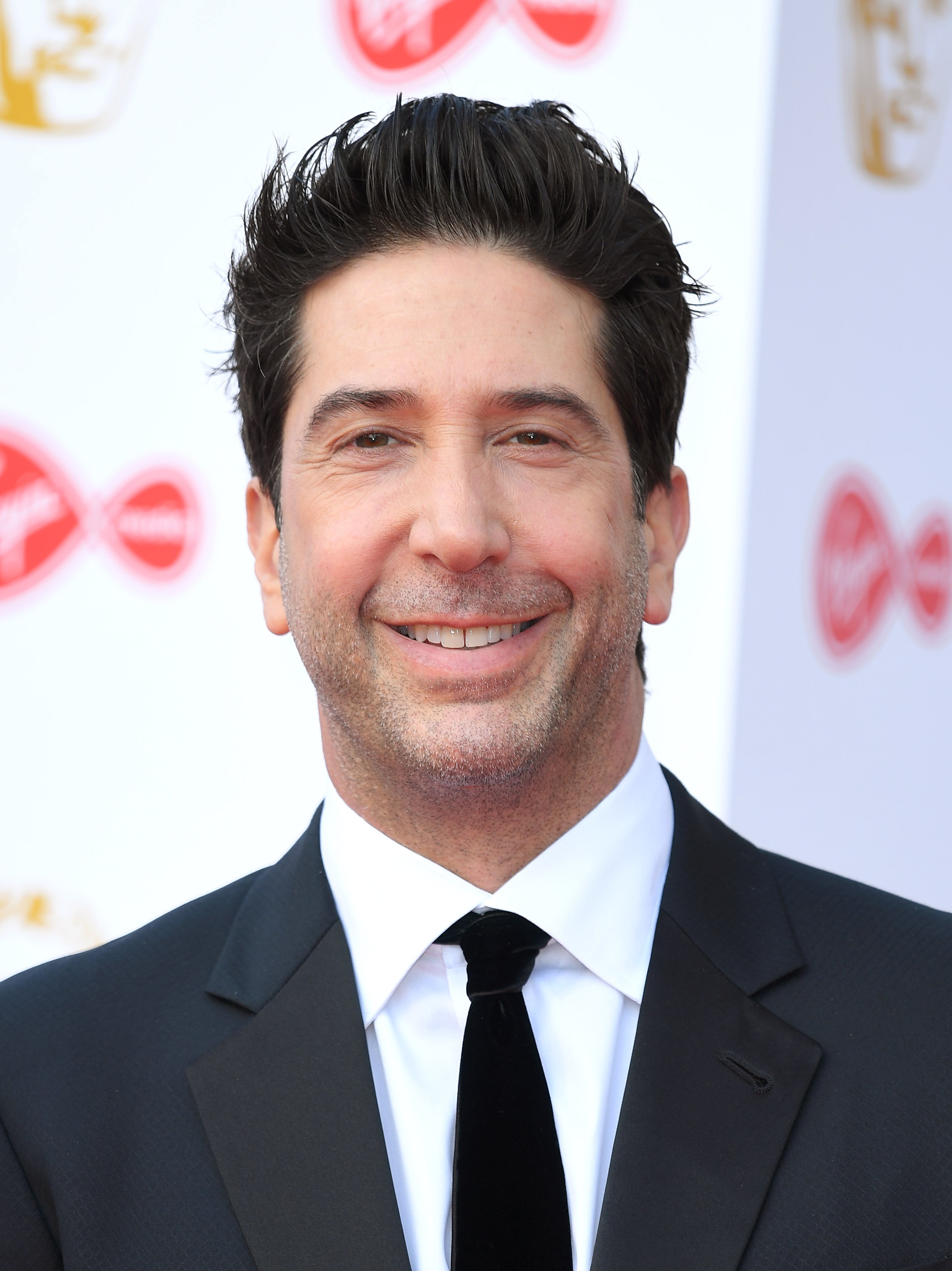 David Schwimmer poses in the Press Room at the Virgin TV BAFTA Television Award at The Royal Festival Hall on May 12, 2019 |Photo: Getty Images