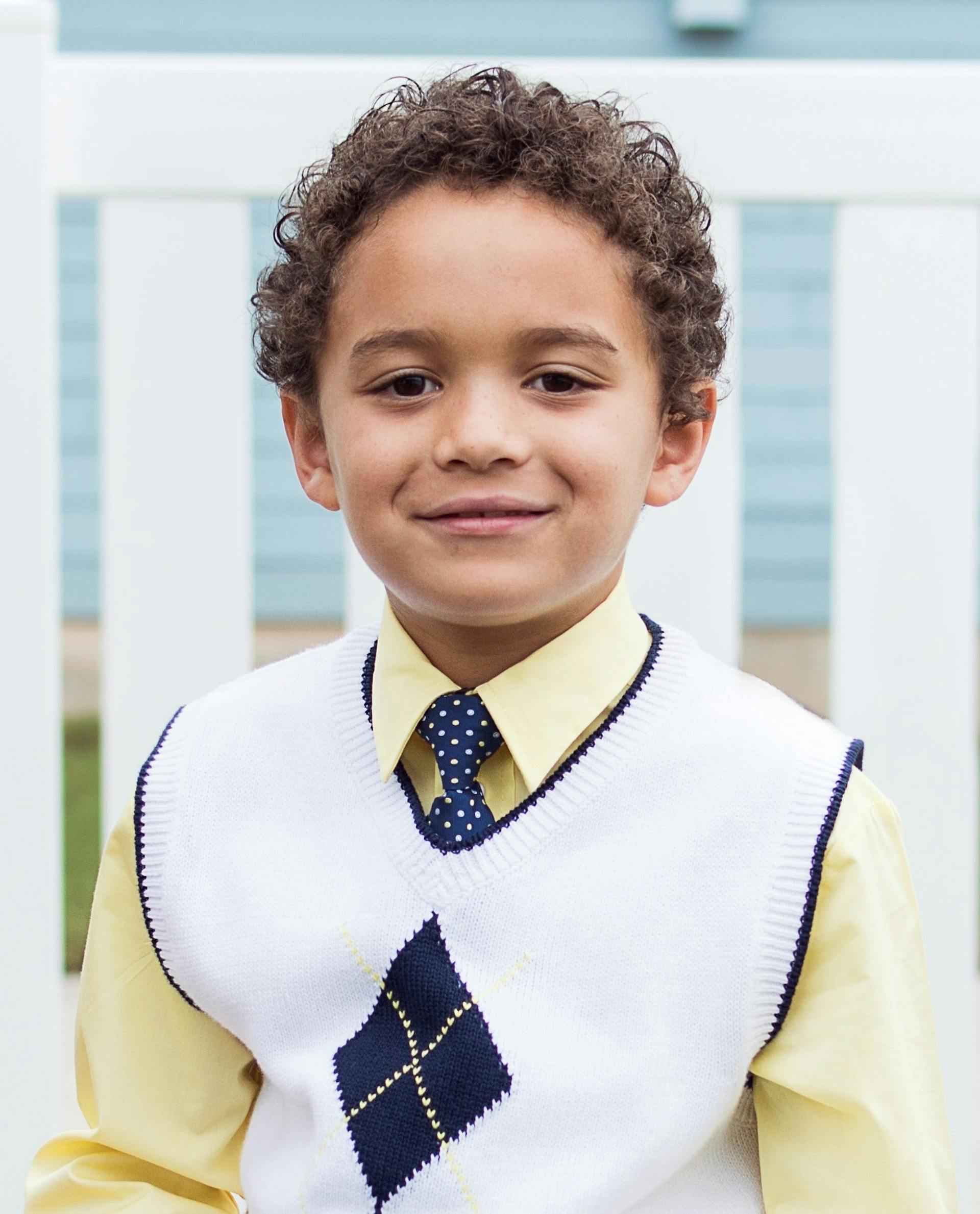 Young boy smiling at the camera | Source: Pexels