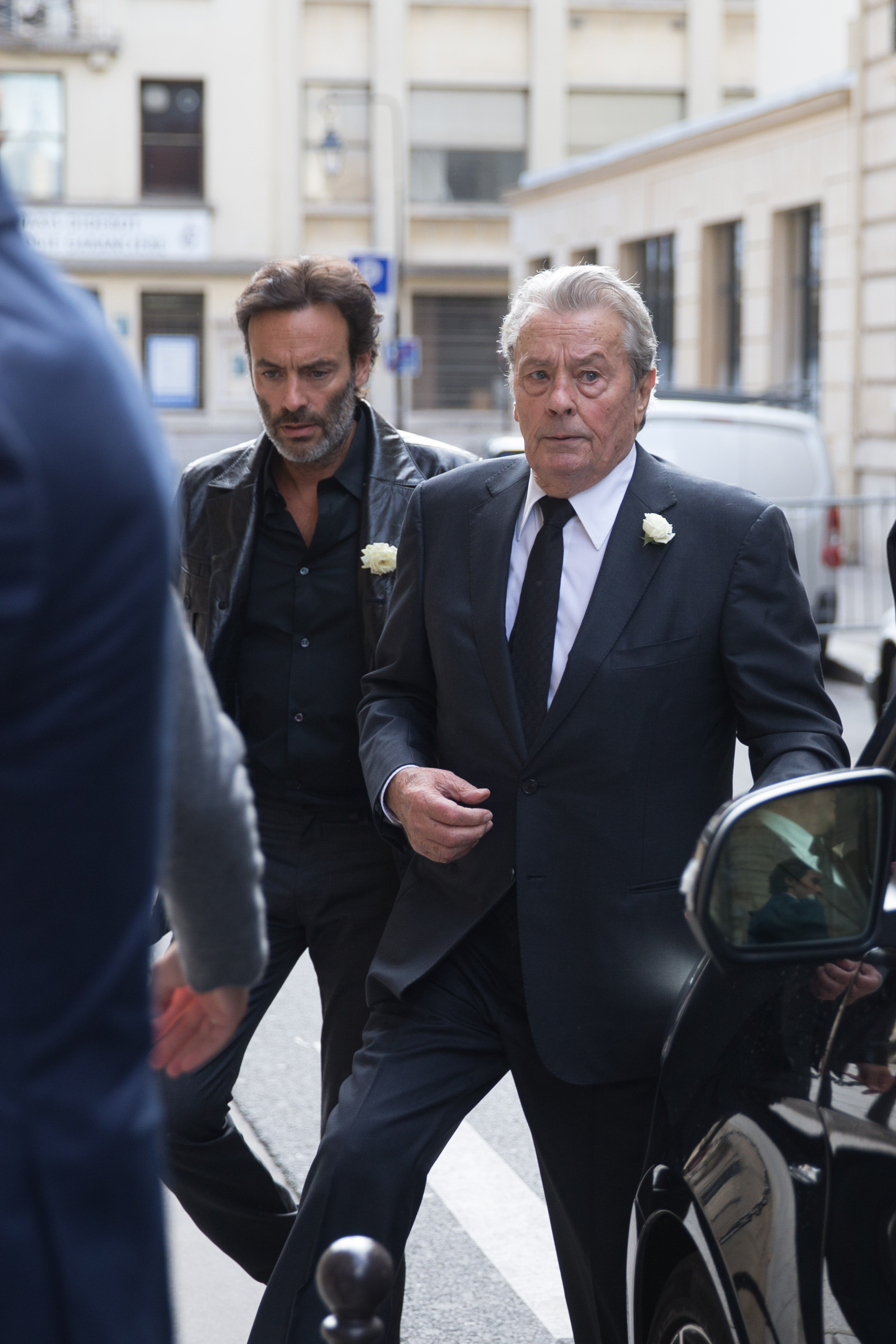 Anthony and Alain Delon at Mireille Darc's funeral on September 1, 2017, in Paris, France. | Source: Getty Images