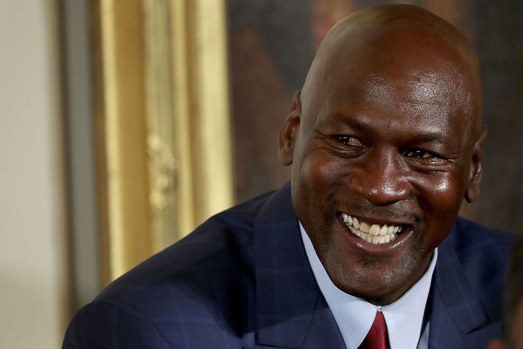 National Basketball Association Hall of Fame member and legendary athlete Michael Jordan smiles before being awarded the Presidential Medal of Freedom by U.S. President Barack Obama during a ceremony in the East Room of the White House on November 22, 2016 | Photo: Getty Images