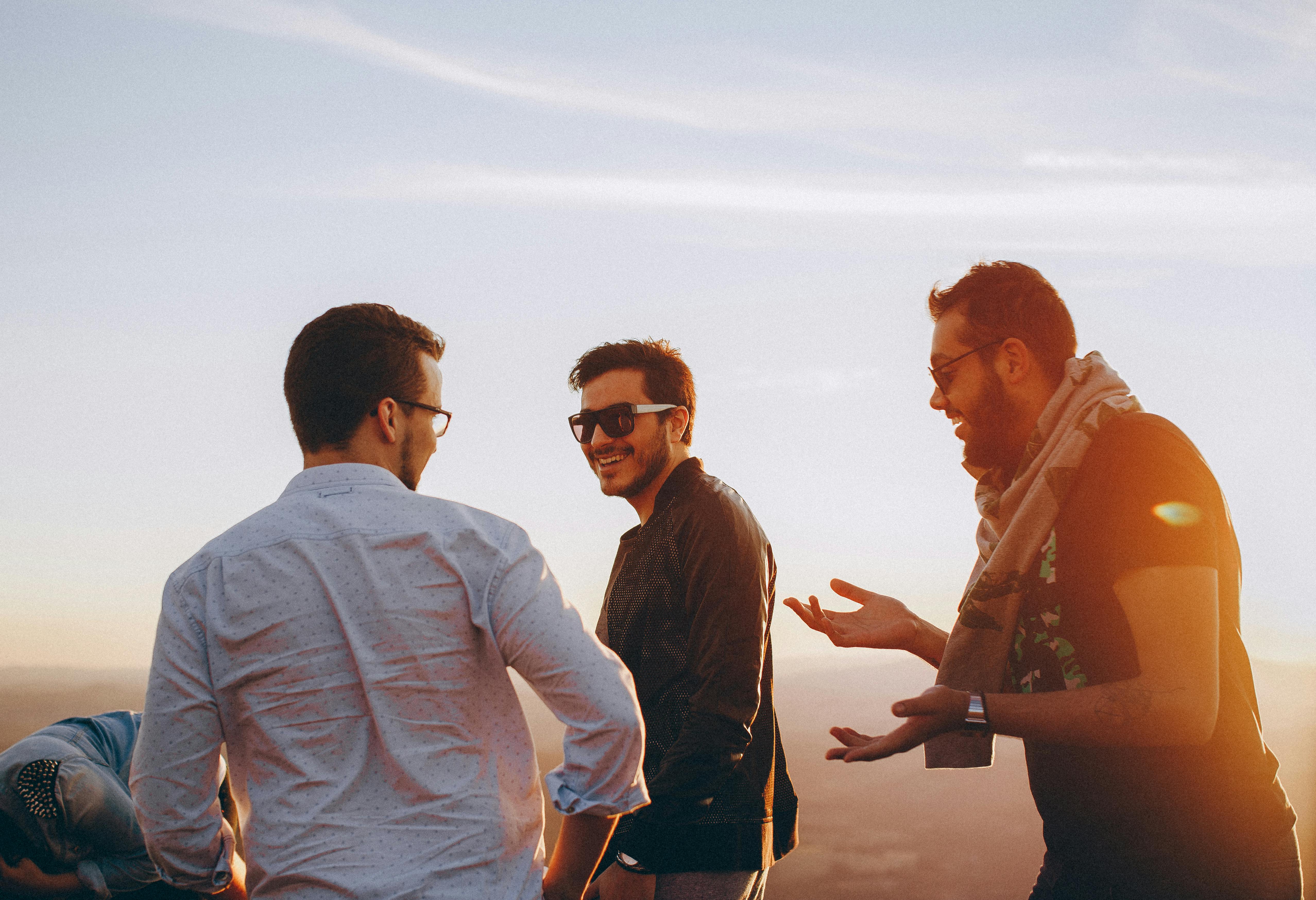 Three men chatting | Source: Pexels