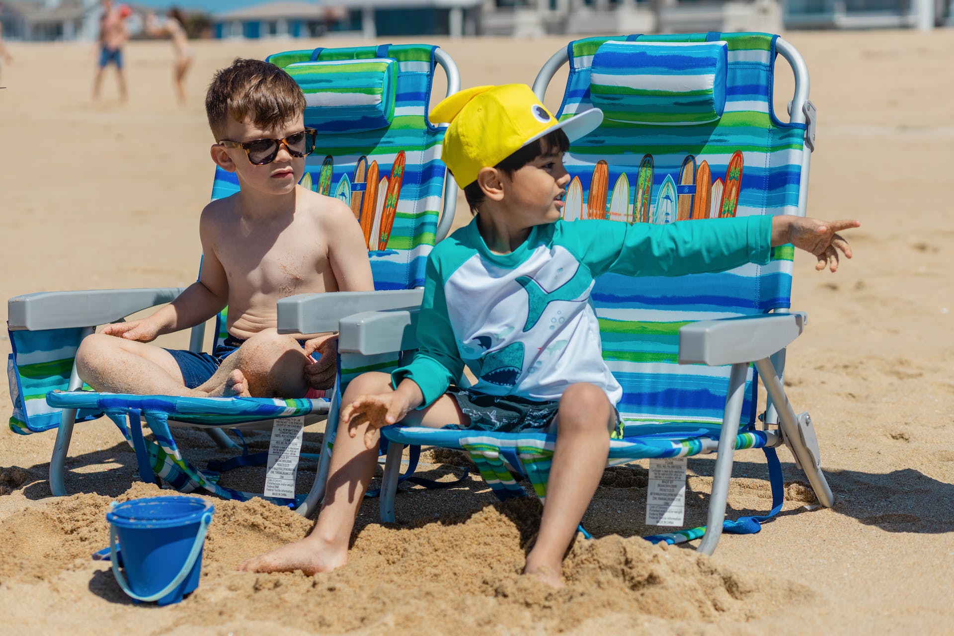 Two boys having fun at the beach | Source: Pexels