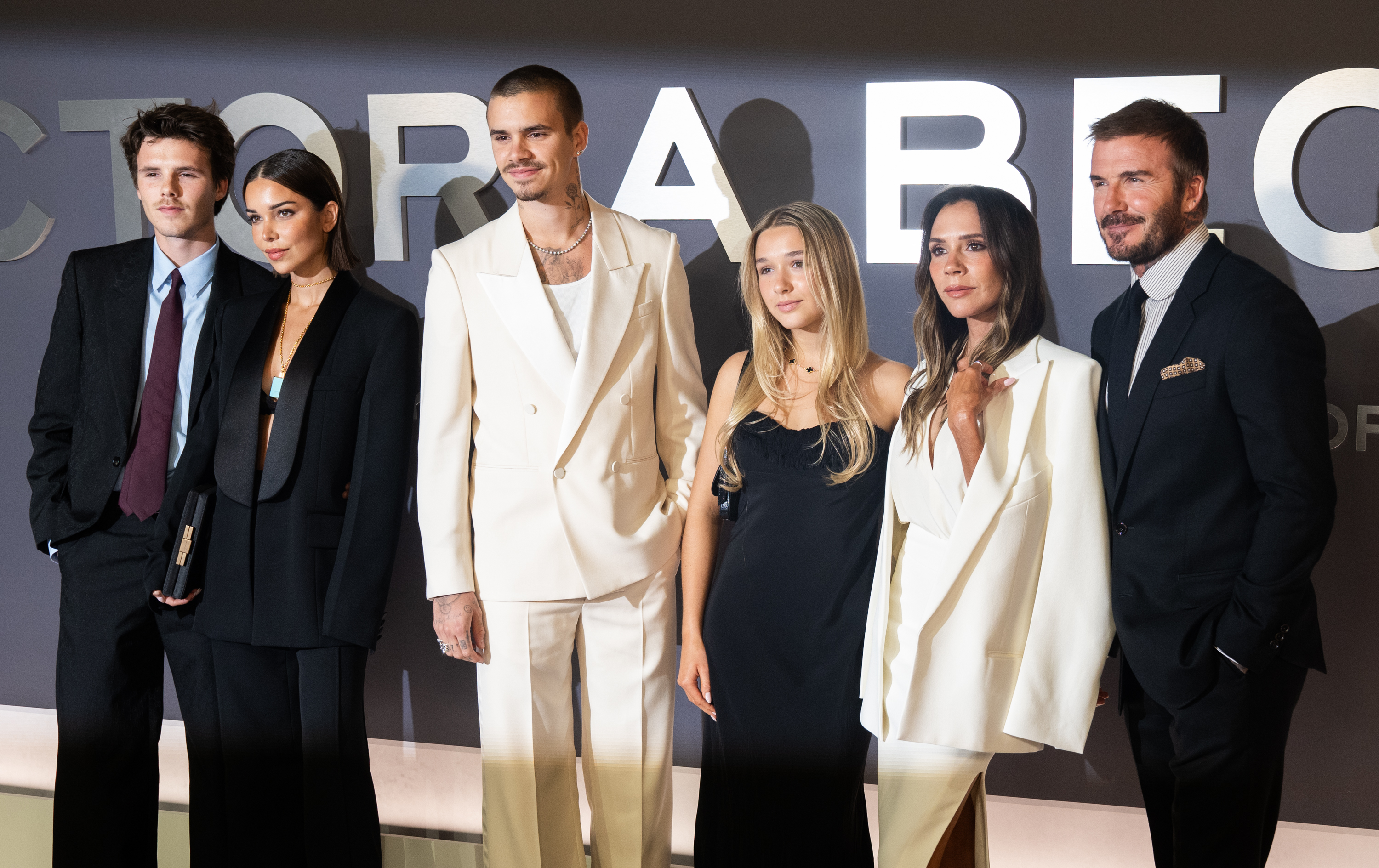 A full Beckham family affair: Apostel joins her beau and his family, including Romeo, Harper, Victoria, and David Beckham, on the red carpet for the world premiere of "Victoria Beckham" at The Curzon Mayfair in London on 8 October 2025. | Source: Getty Images