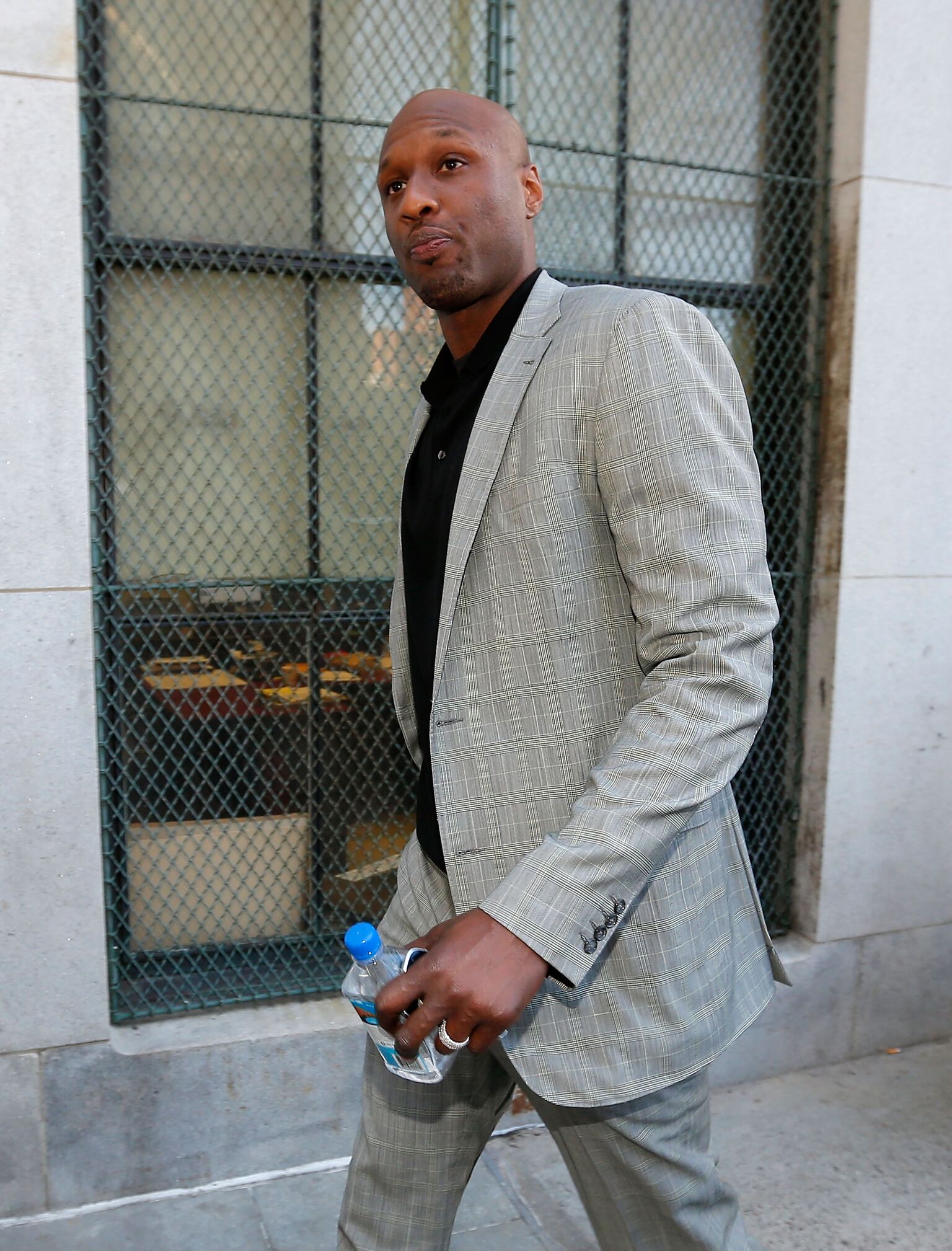  Lamar Odom arrives to attend a custody hearing with ex-girlfriend Liza Morales | Getty Images