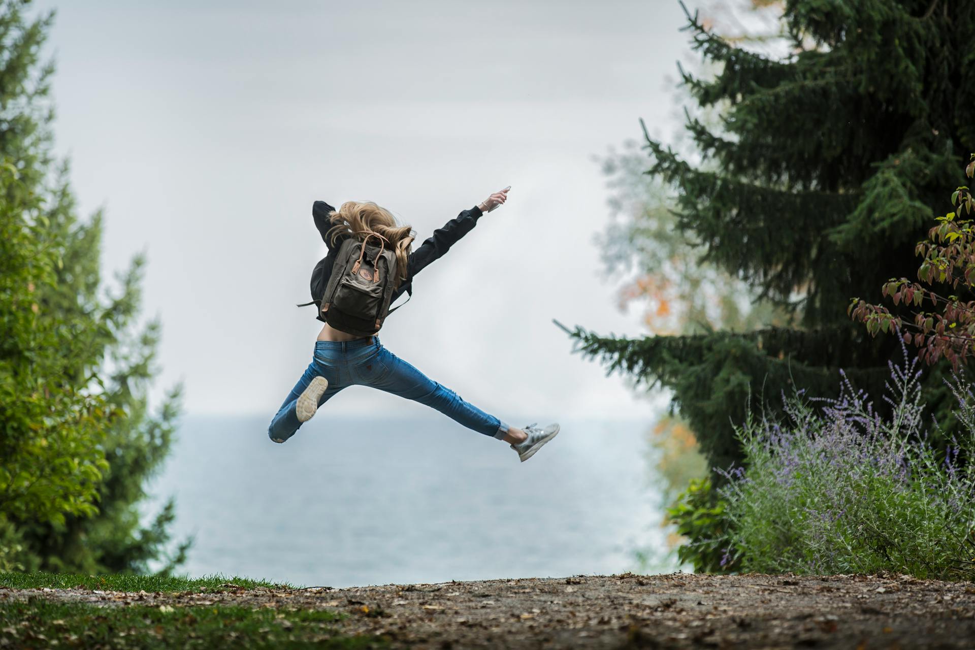 A woman jumping for joy | Source: Pexels