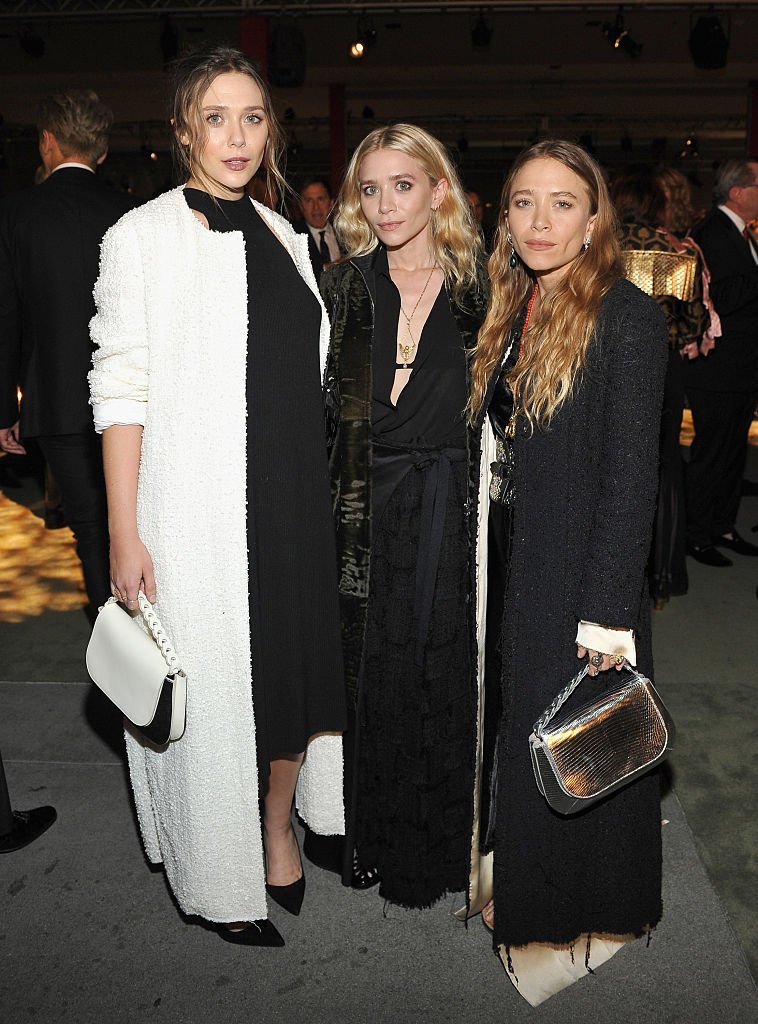 Actresses Elizabeth, Ashley, and Mary Kate Olsen at LACMA on October 29, 2016 in Los Angeles, California | Source: Getty Images