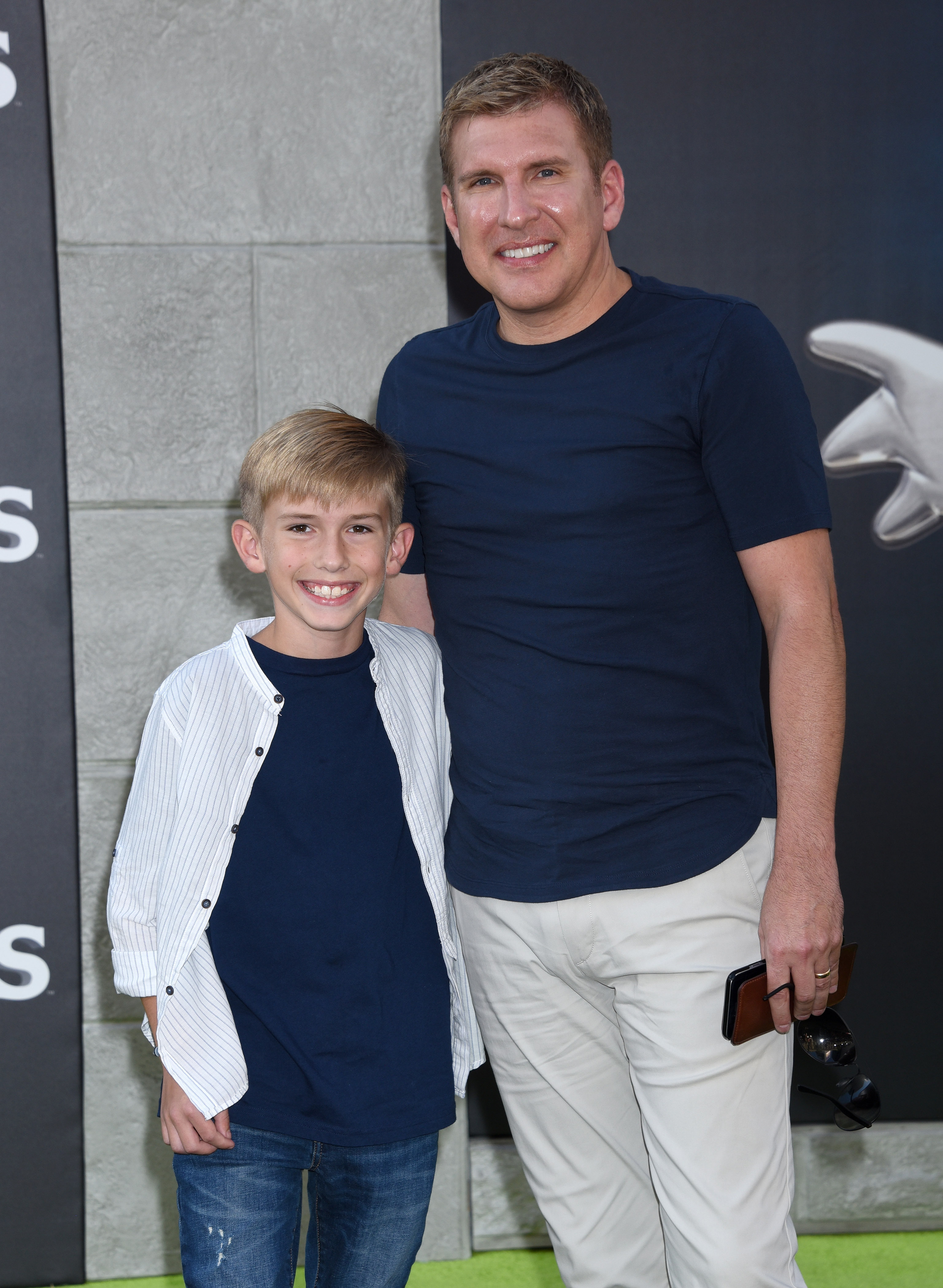 Todd Chrisley and son Grayson attend the premiere of "Ghostbuster" in Hollywood, California on July 9, 2016 | Photo: Getty Images
