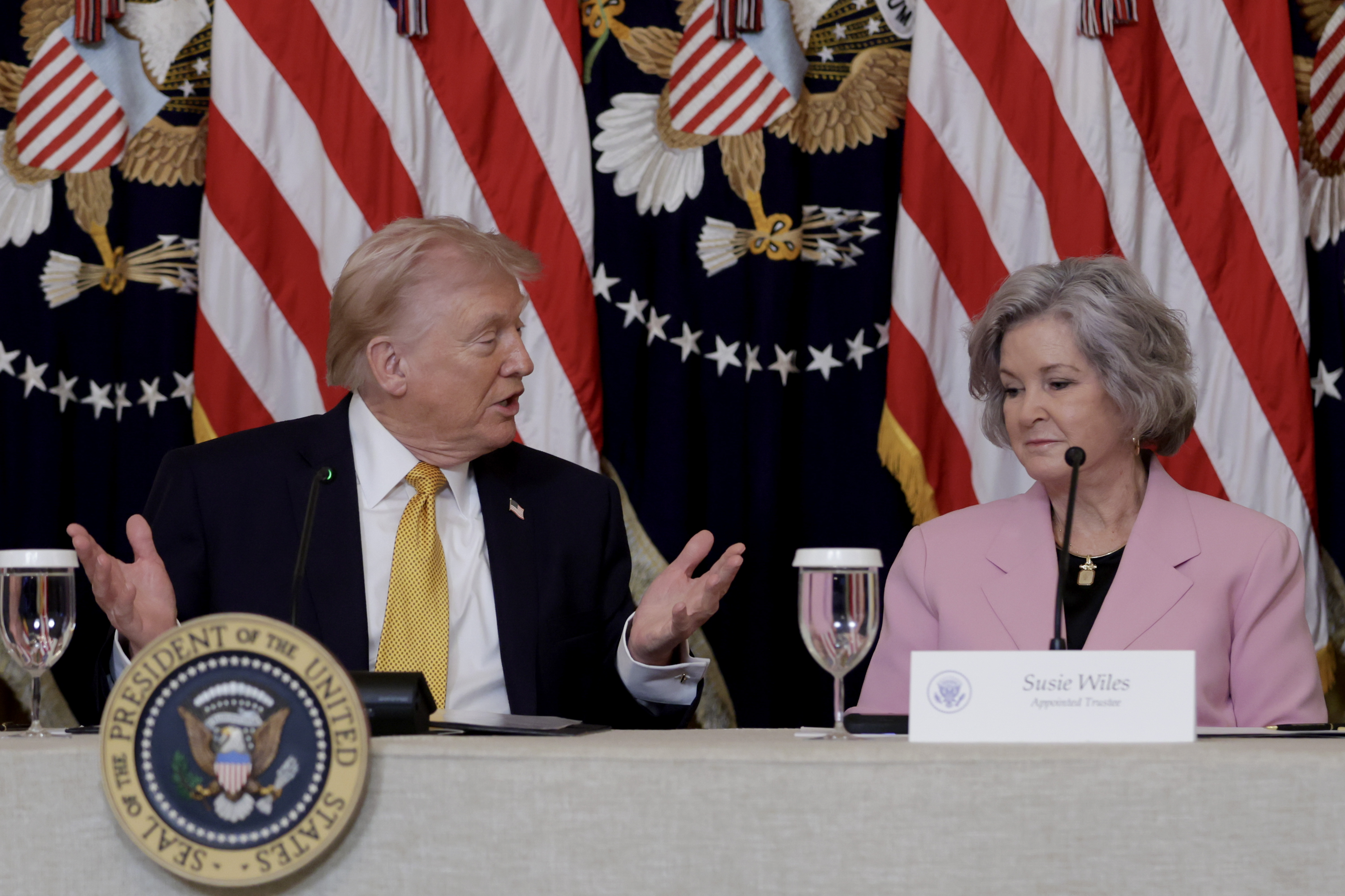 Donald Trump sits with Susie Wiles in the East Room of the White House on March 16, 2026 | Source: Getty Images
