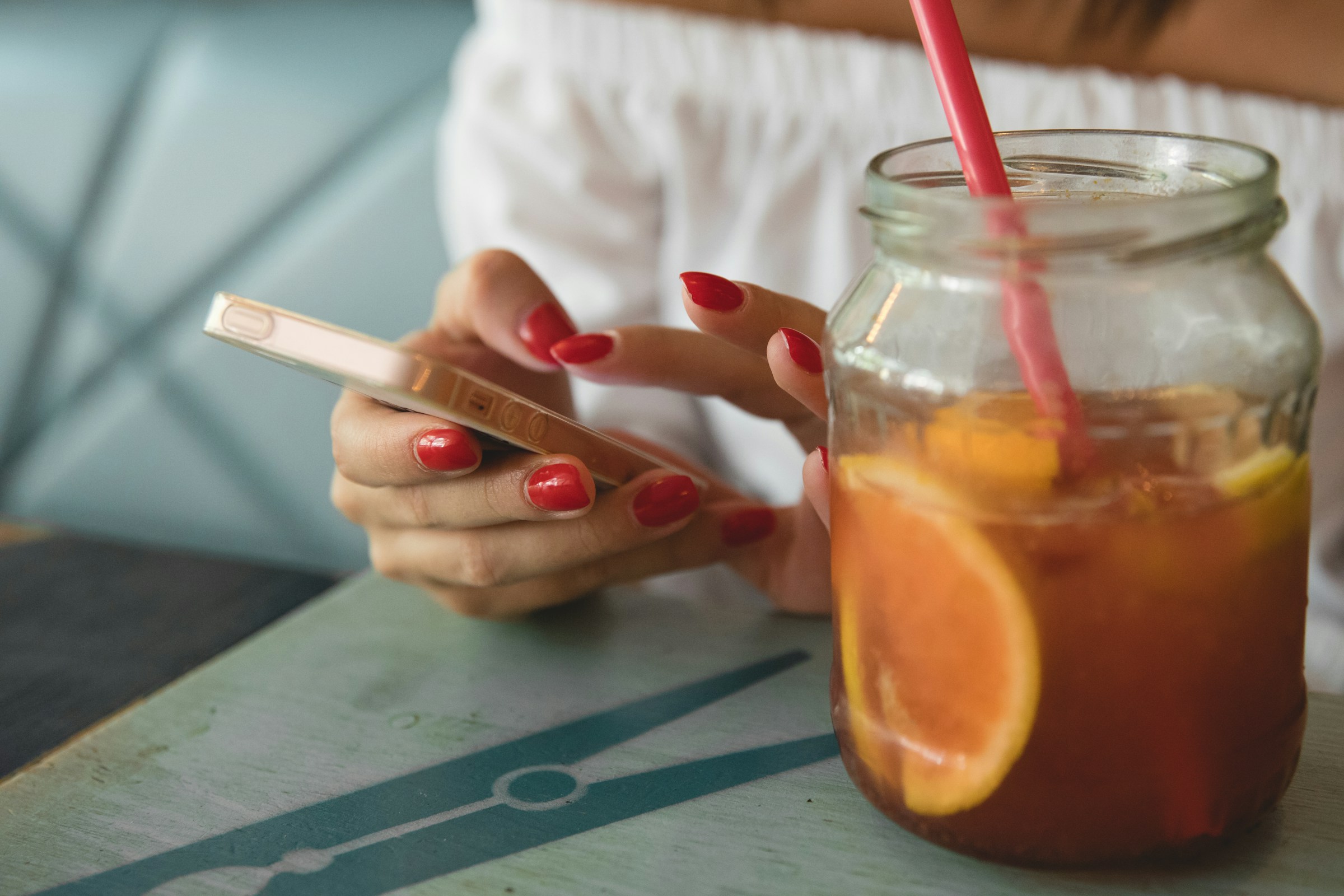 A woman using a smartphone | Source: Unsplash