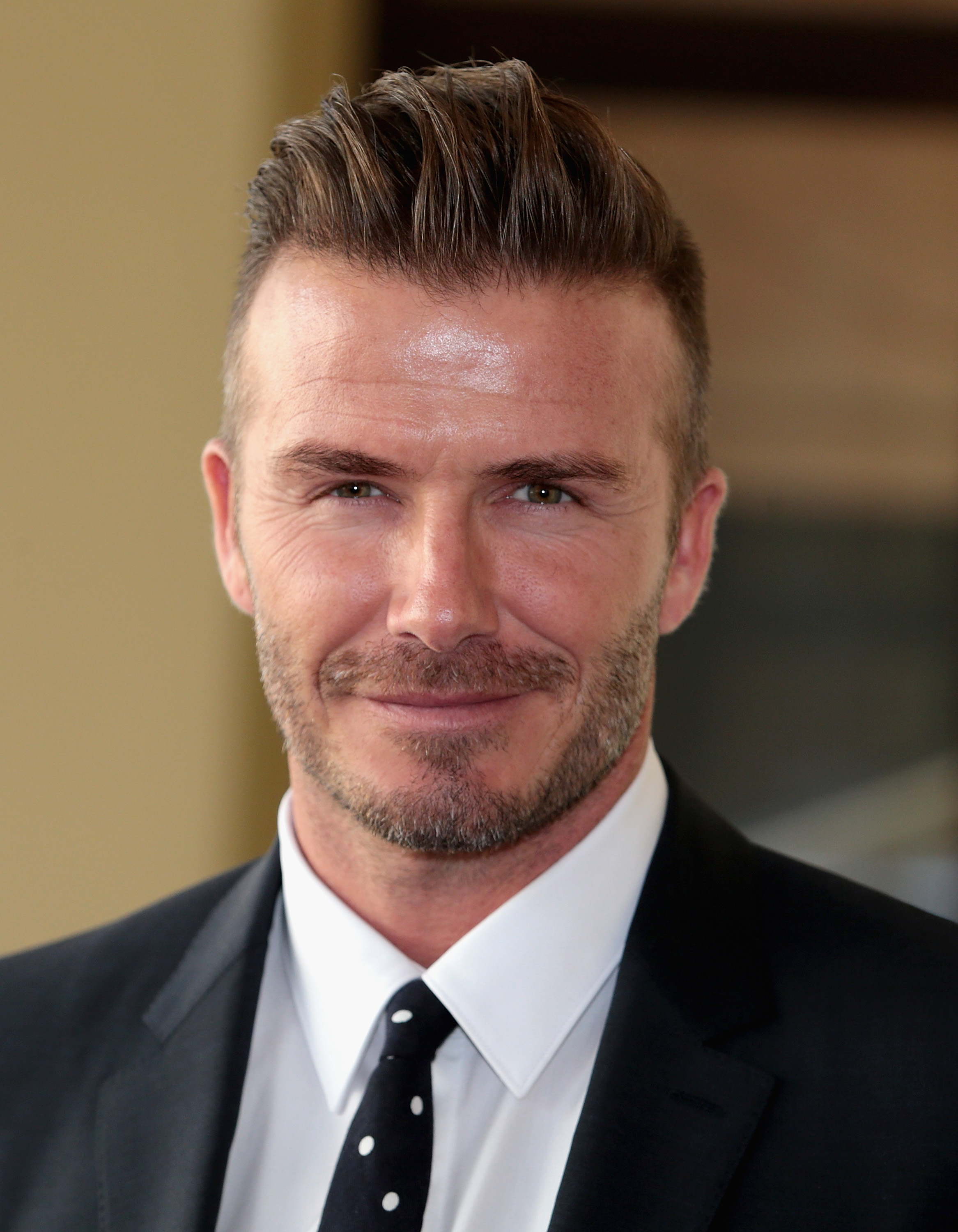 David Beckham at Buckingham Palace for the Queen's Young Leaders Event on June 22, 2015 in London, England. | Source: Getty Images