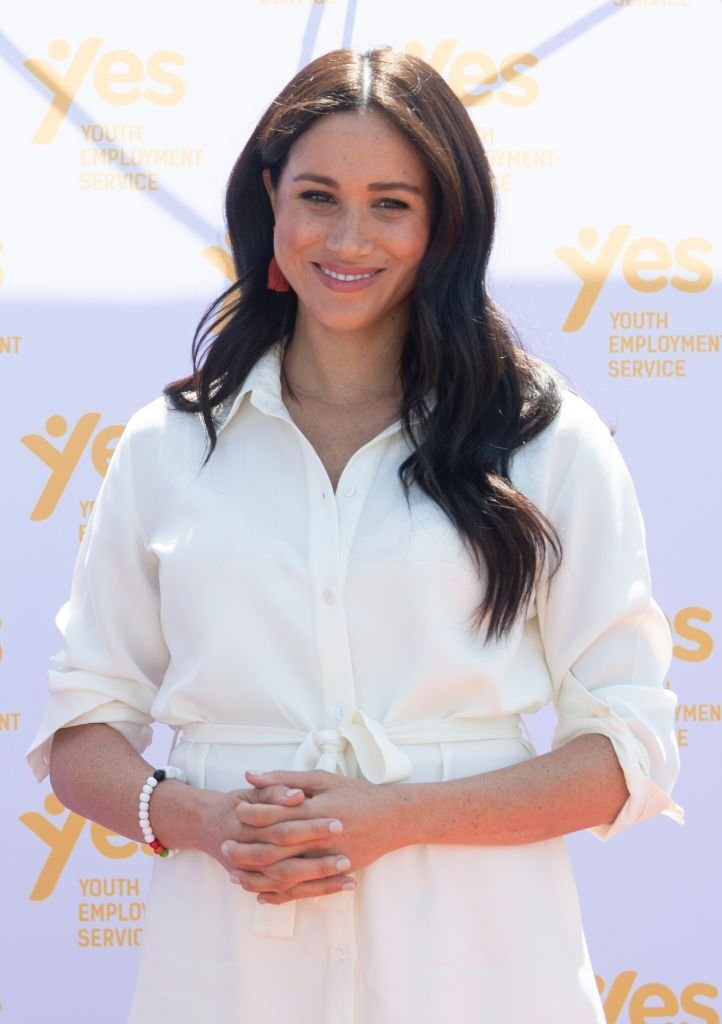Meghan Markle visits a township with Prince Harry, Duke of Sussex to learn about Youth Employment Services on October 02, 2019 in Johannesburg, South Africa. | Source: Getty Images