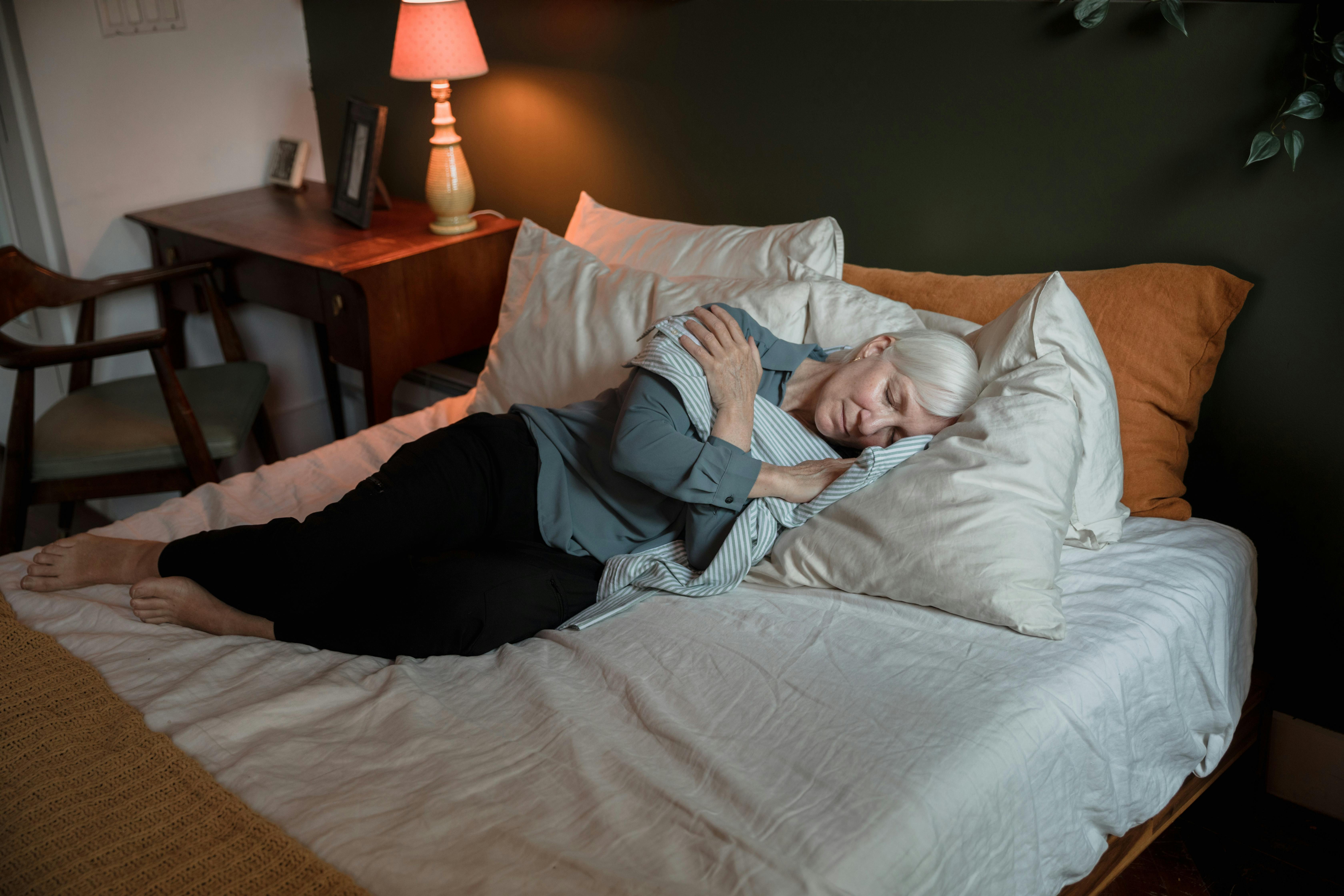 An unwell woman in bed | Source: Pexels