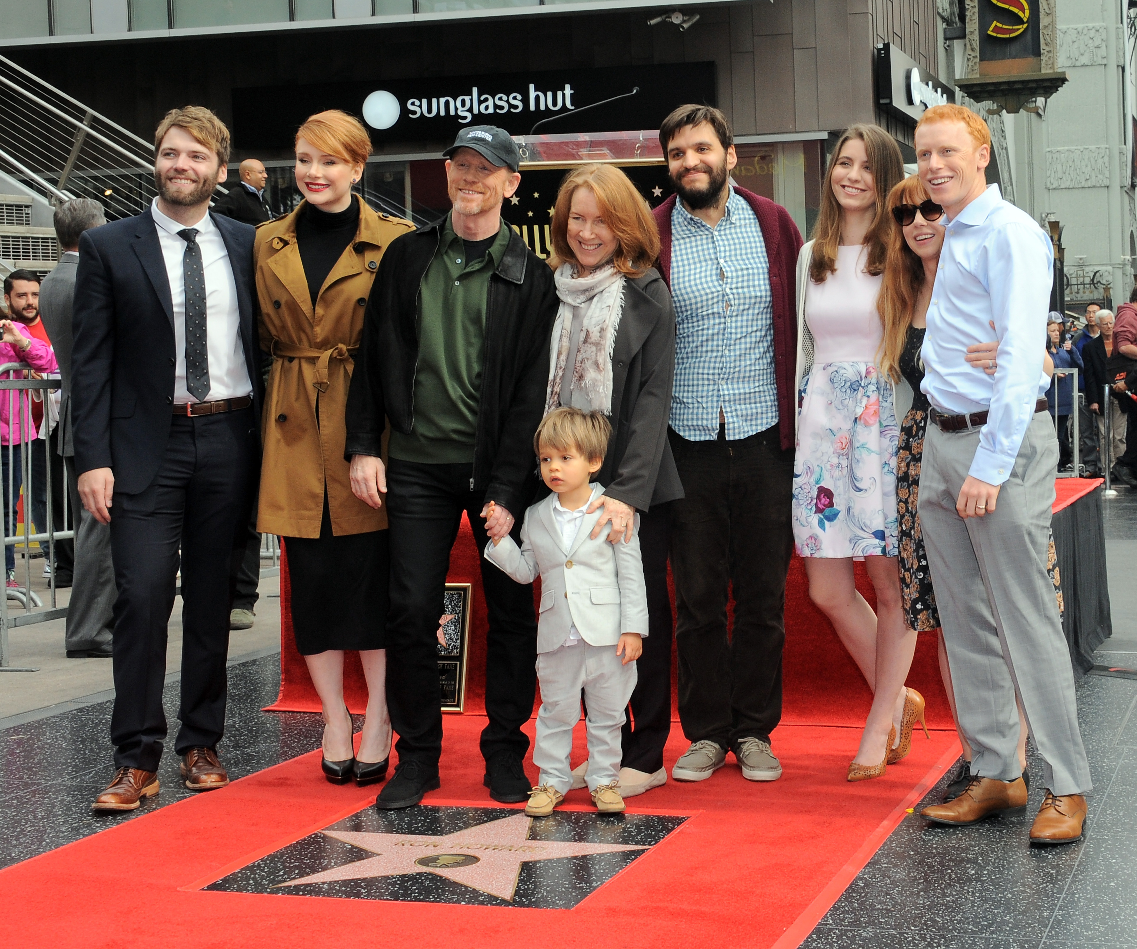 Seth Gabel, actress Bryce Dallas Howard, director/father Ron Howard and mother Cheryl Howard at the Ron Howard Star ceremony on The Hollywood Walk Of Fame held on December 10, 2015 in Hollywood, California | Source: Getty Images