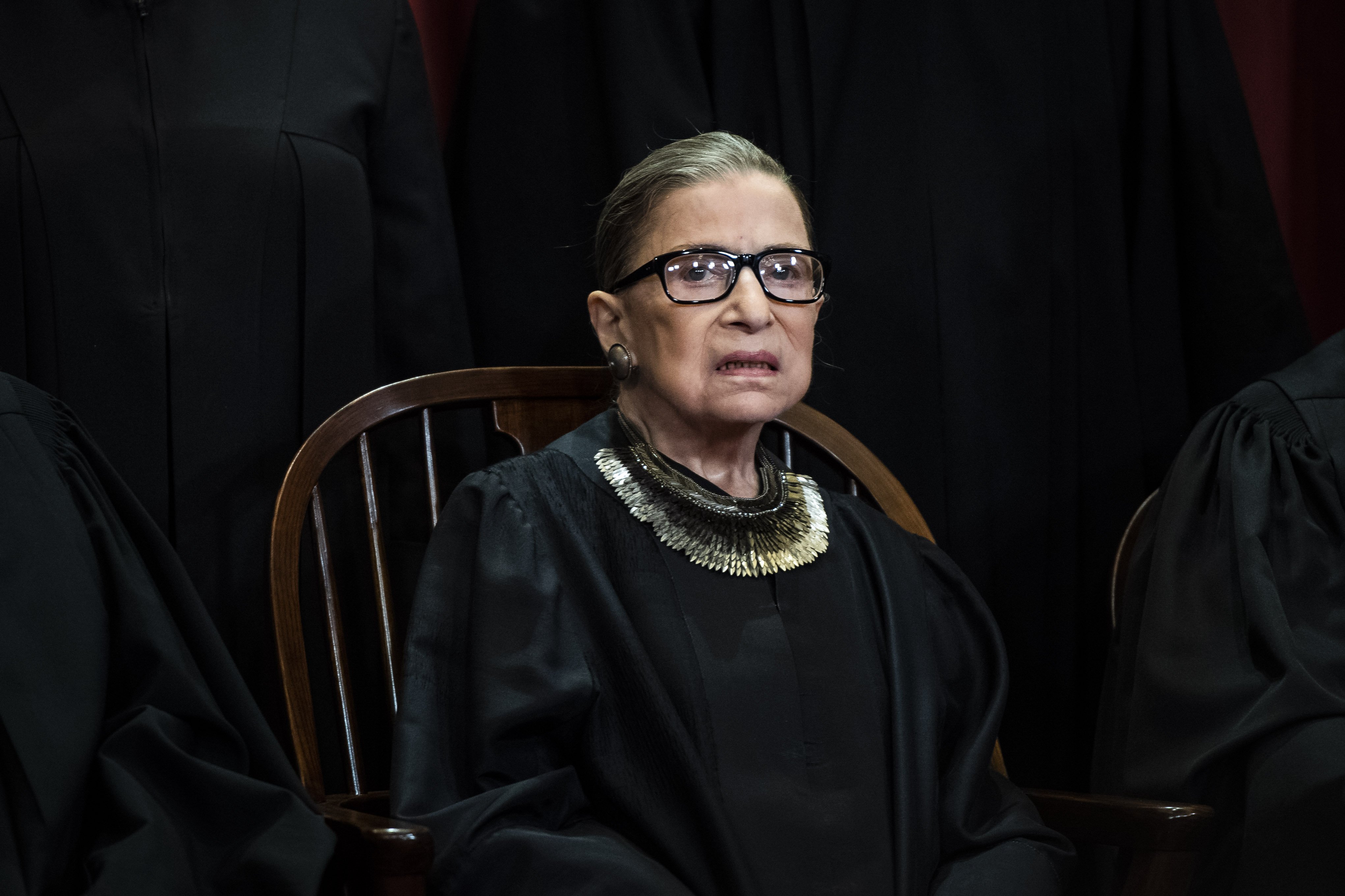 Ruth Bader Ginsburg poses during official group photo at the Supreme Court on Friday, Nov. 30, 2018, in Washington, DC. | Source: Getty Images.