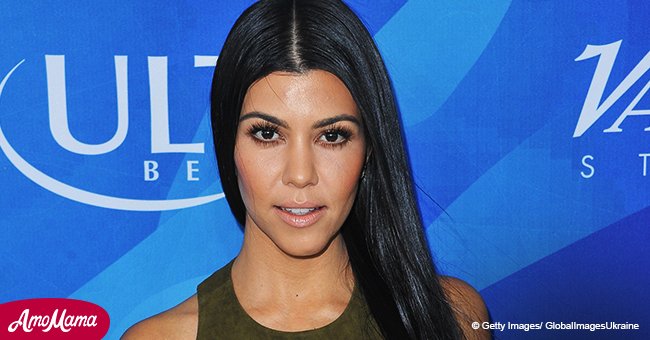 Kourtney Kardashian, 39, flaunts her toned legs and midriff as she rocks a mint green swimsuit