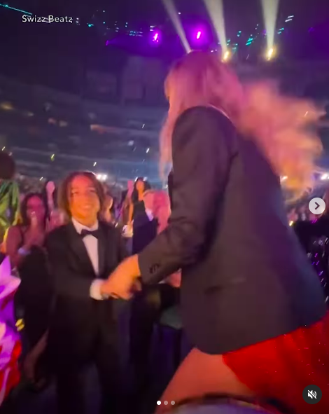 Taylor Swift dancing with Alicia Keys and Swizz Beatz's son Genesis Dean at the Grammy Awards, posted on February 3, 2025. | Source: Instagram/entertainmenttonight