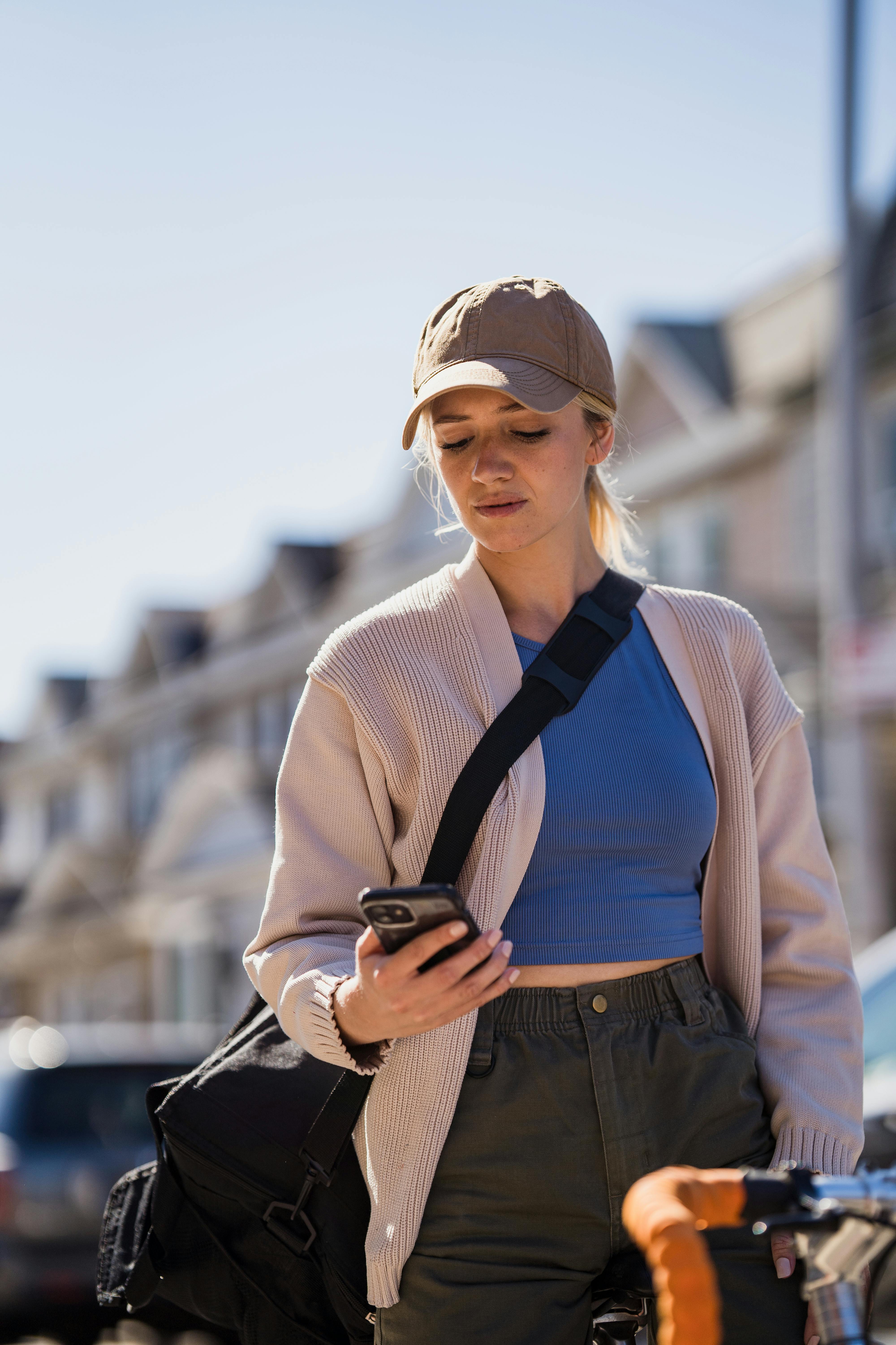 A woman staring at her phone | Source: Pexels