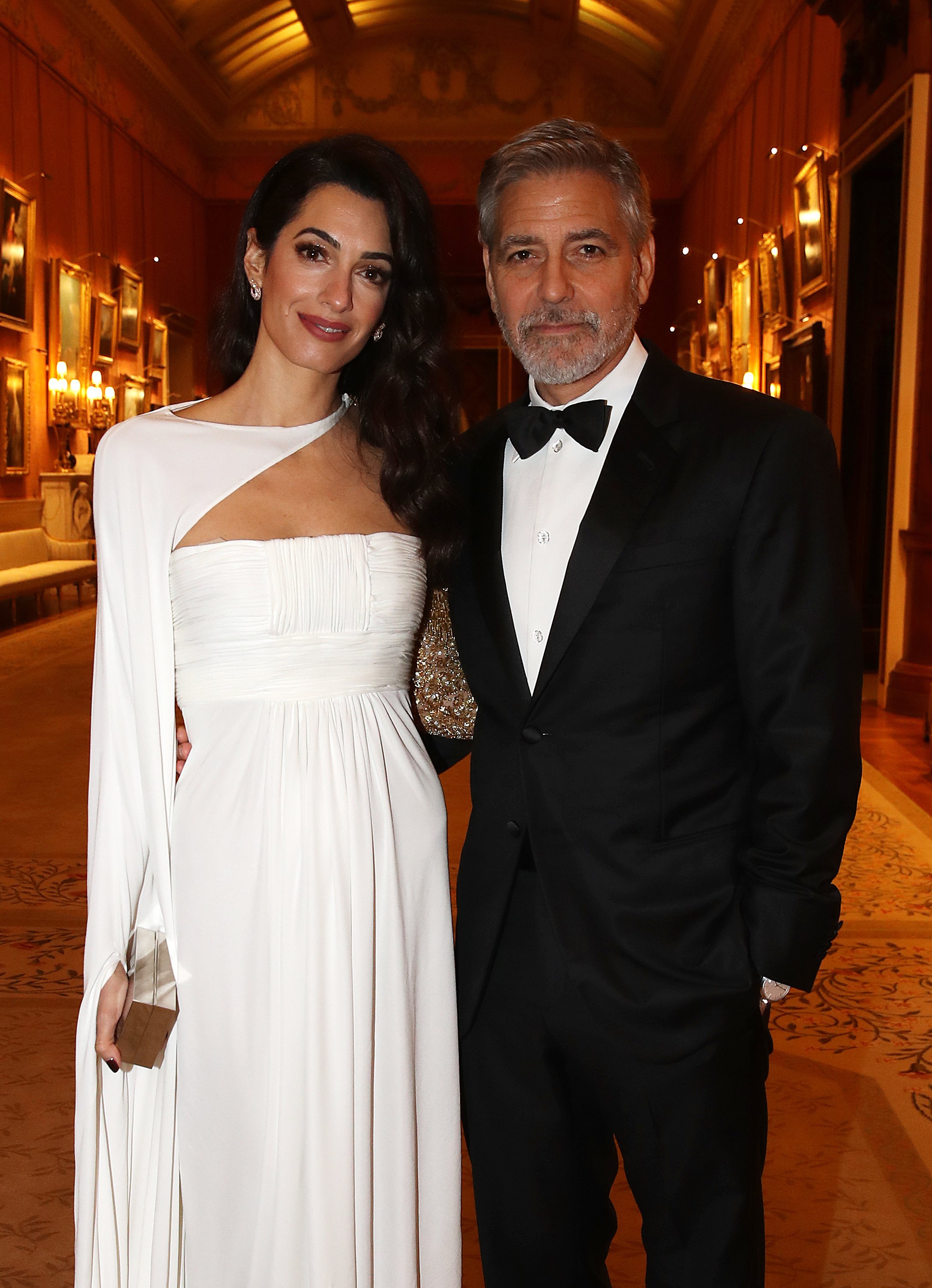 Amal Clooney y George Clooney durante una cena de celebración de The Prince's Trust en el Palacio de Buckingham el 12 de marzo de 2019 en Londres, Inglaterra. | Foto: Getty Images