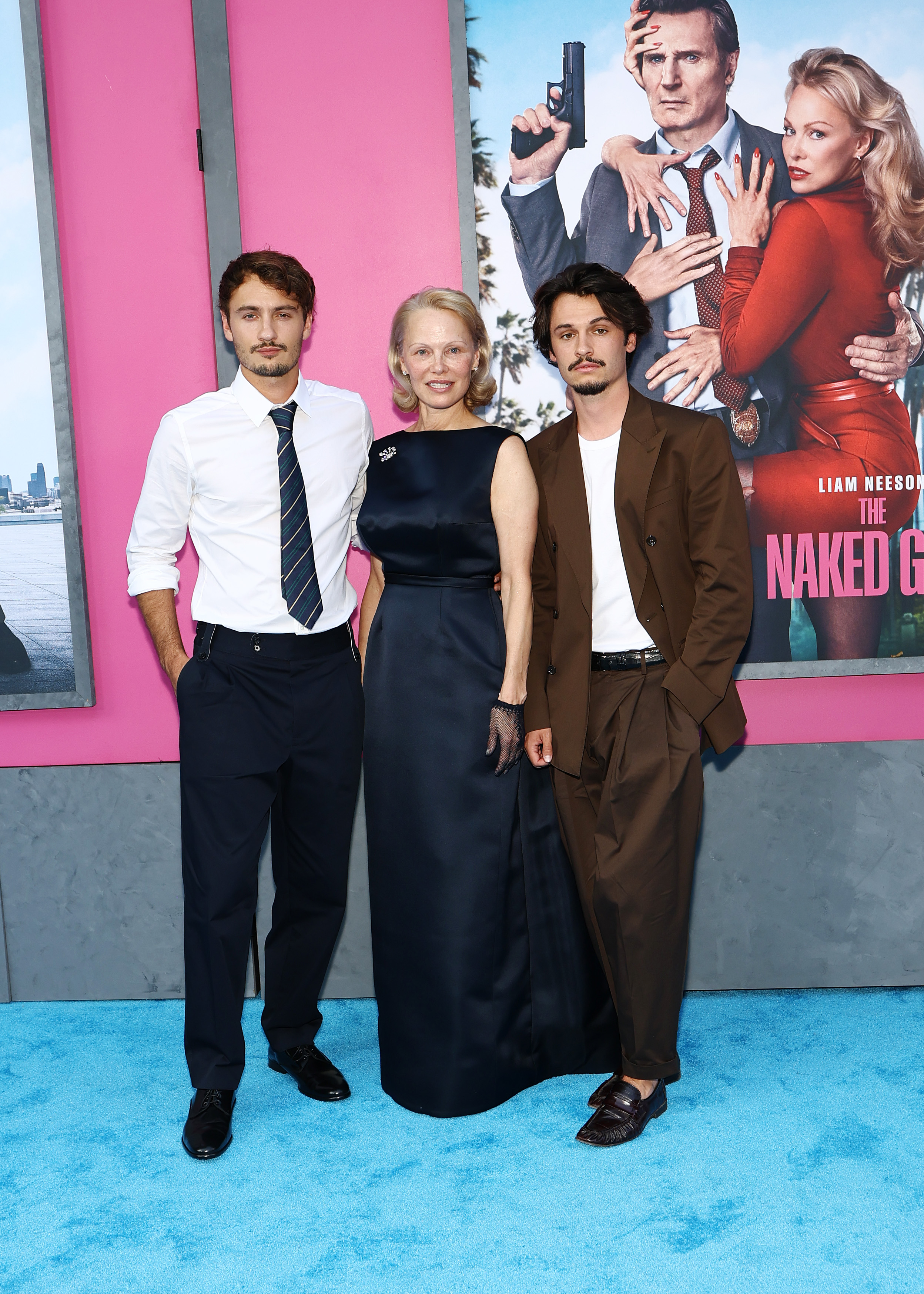 Brandon Thomas Lee, Pamela Anderson, and Dylan Jagger Lee attend "The Naked Gun" New York Premiere on July 28, 2025 | Source: Getty Images