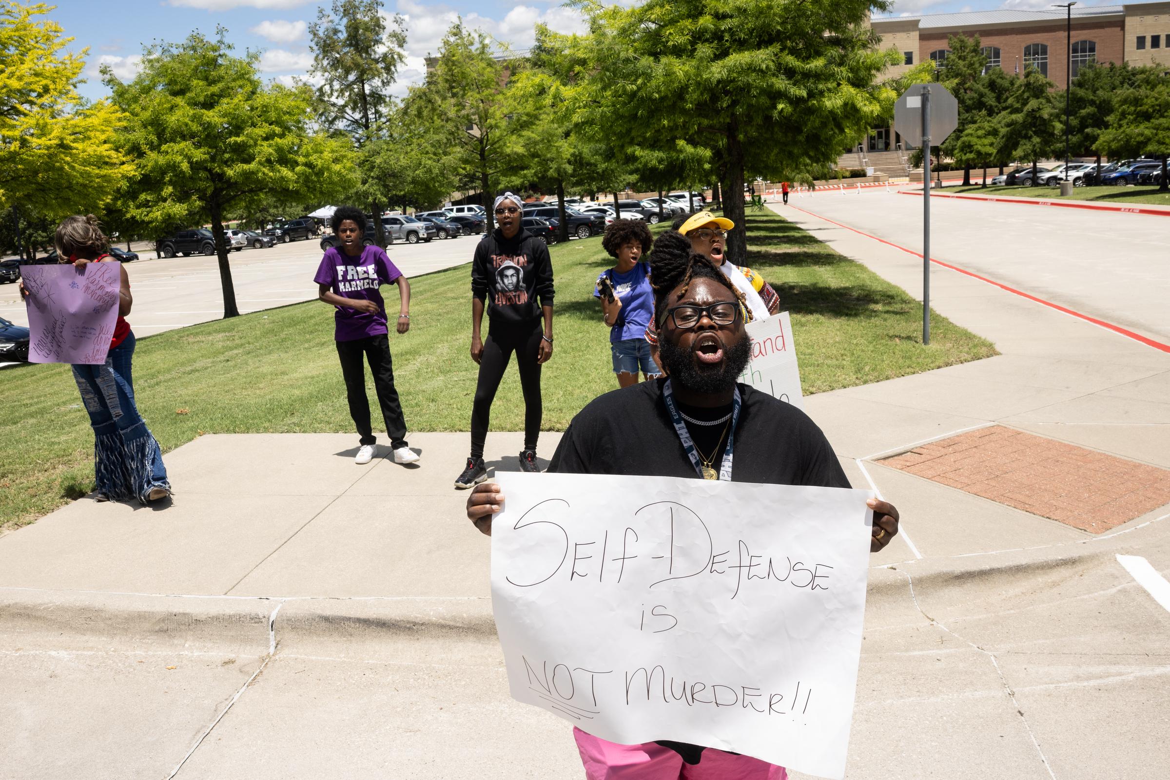 Karmelo Anthony's extended family member Michael Wilson, front, of Fort Worth and other supporters of Anthony chant outside of the Collin County Courthouse as Anthony's murder trial is underway in McKinney, TX, Saturday, June 6, 2026. | Source: Getty Images