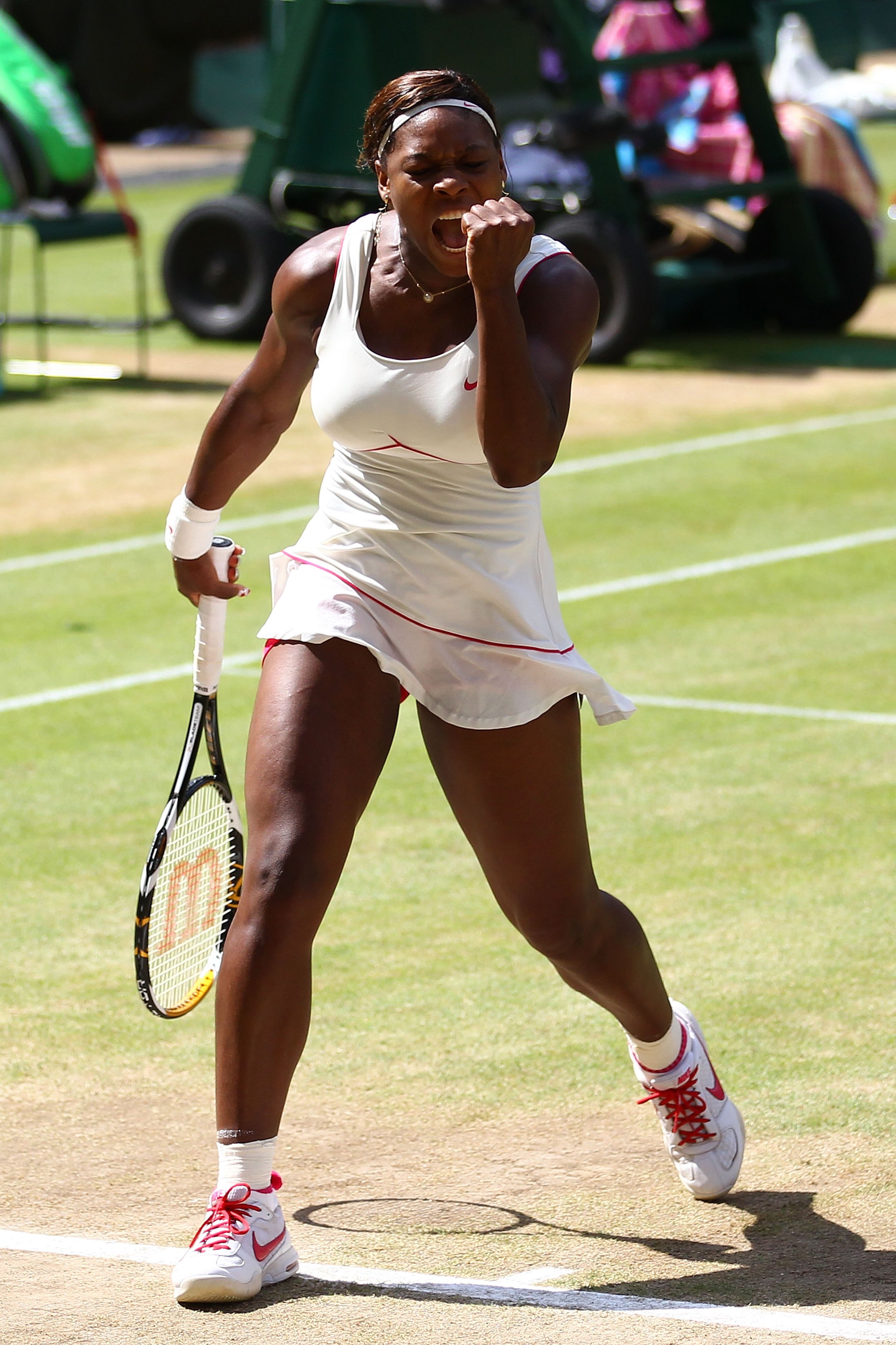 Serena Williams celebrates a point during the Ladies Singles Final Match against Vera Zvonareva of Russia on day 12 of the Wimbledon Lawn Tennis Championships on July 3, 2010 | Source: Getty Images